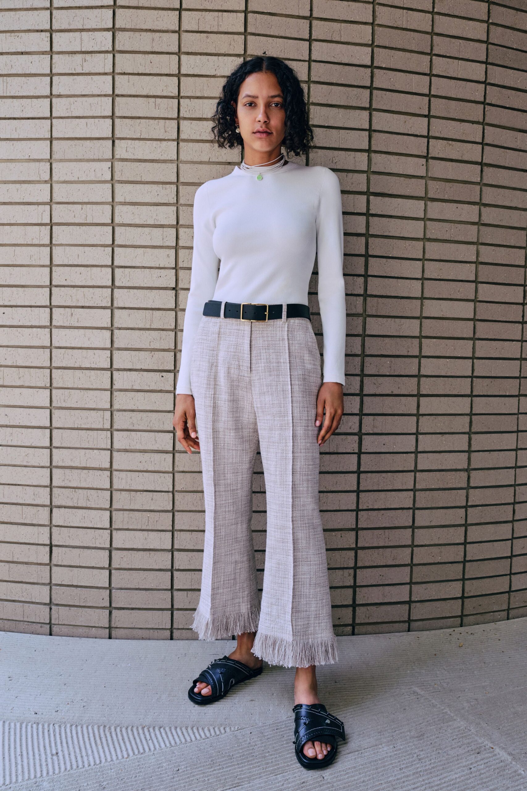 white fitted top beige relaxed pants