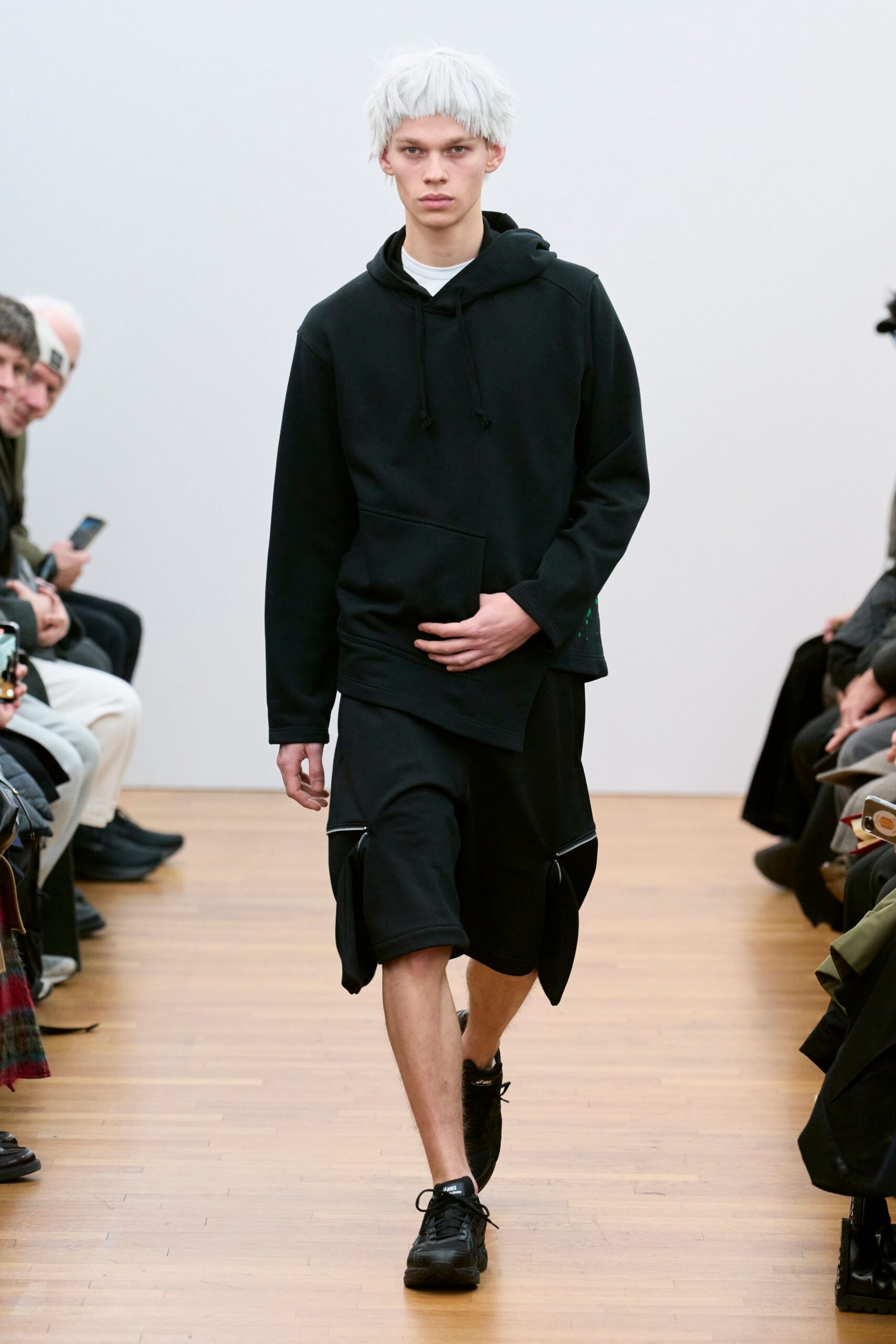 black hoodie and shorts outfit