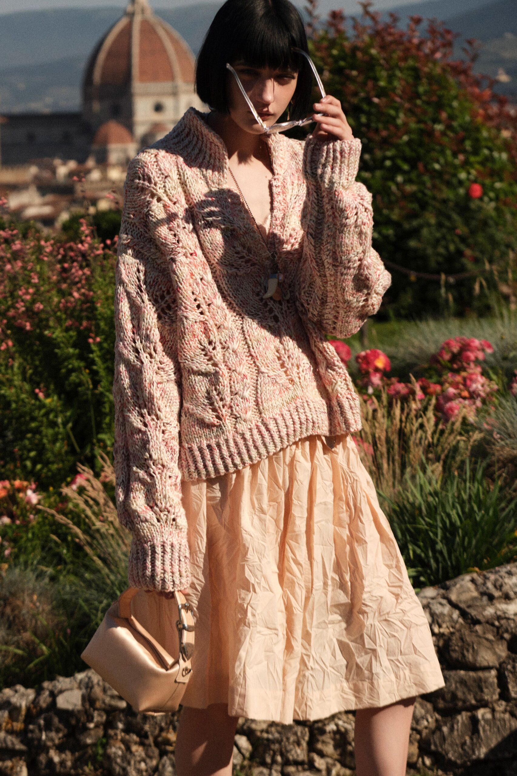pink oversized sweater with pleated skirt