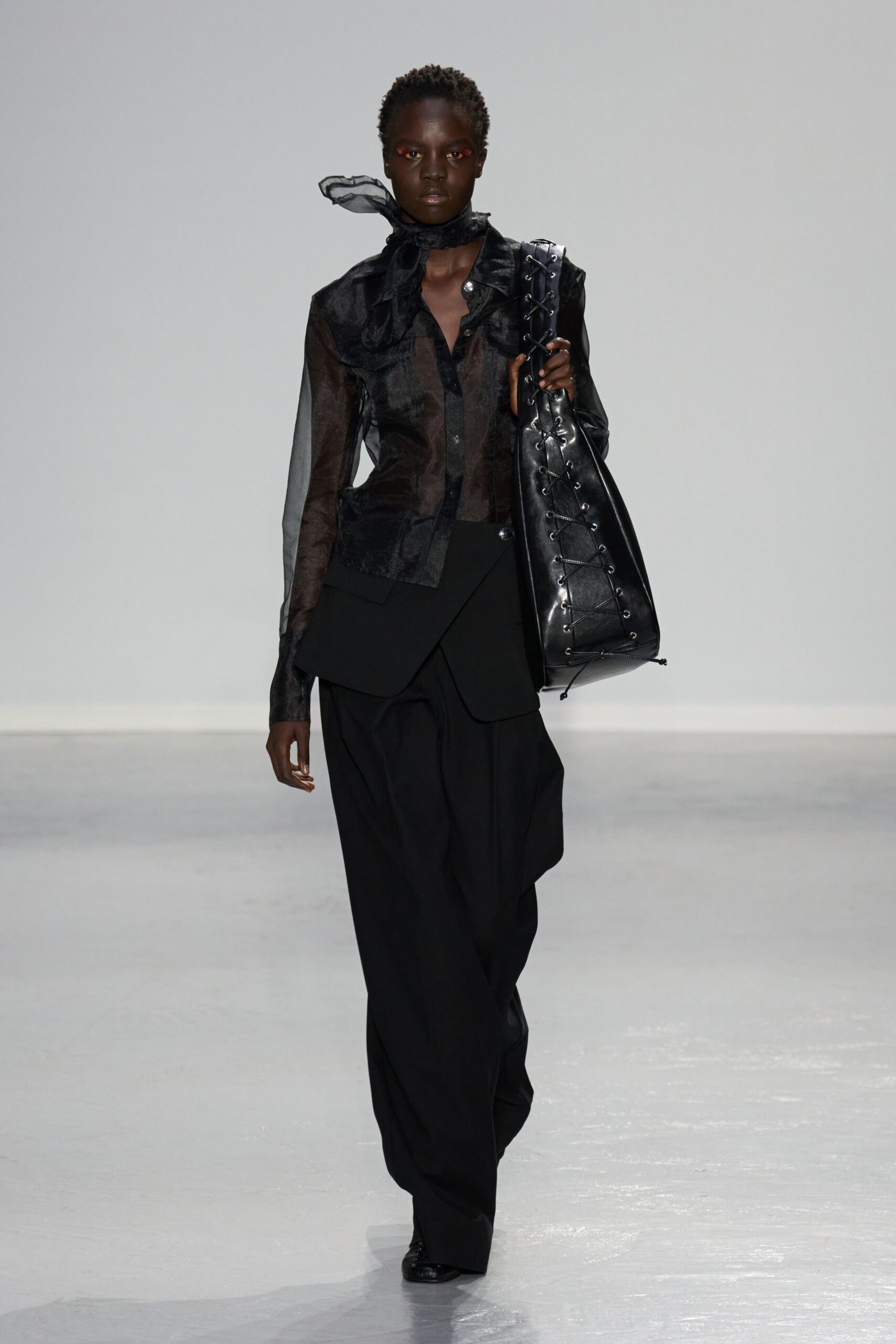 black silk shirt with wide-leg pants