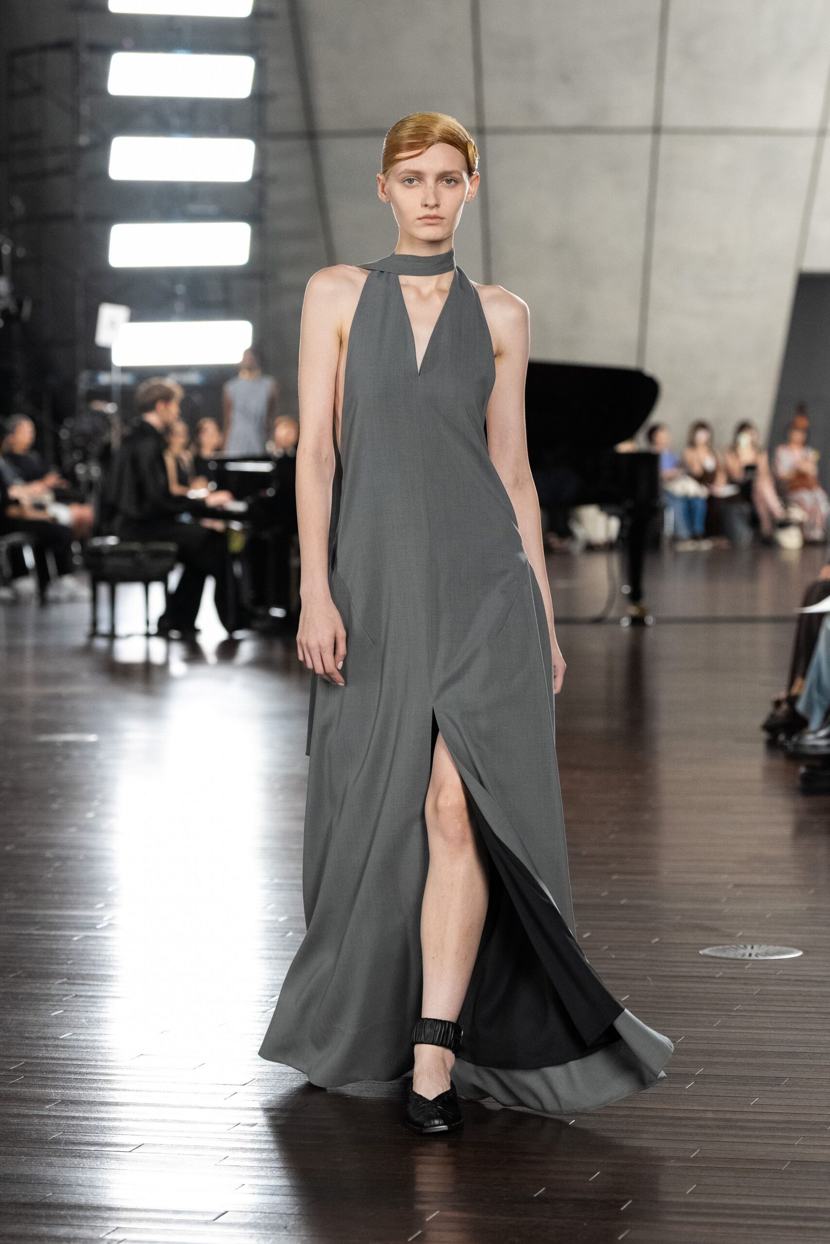 gray silk sleeveless high-neck fitted flowing maxi gown
