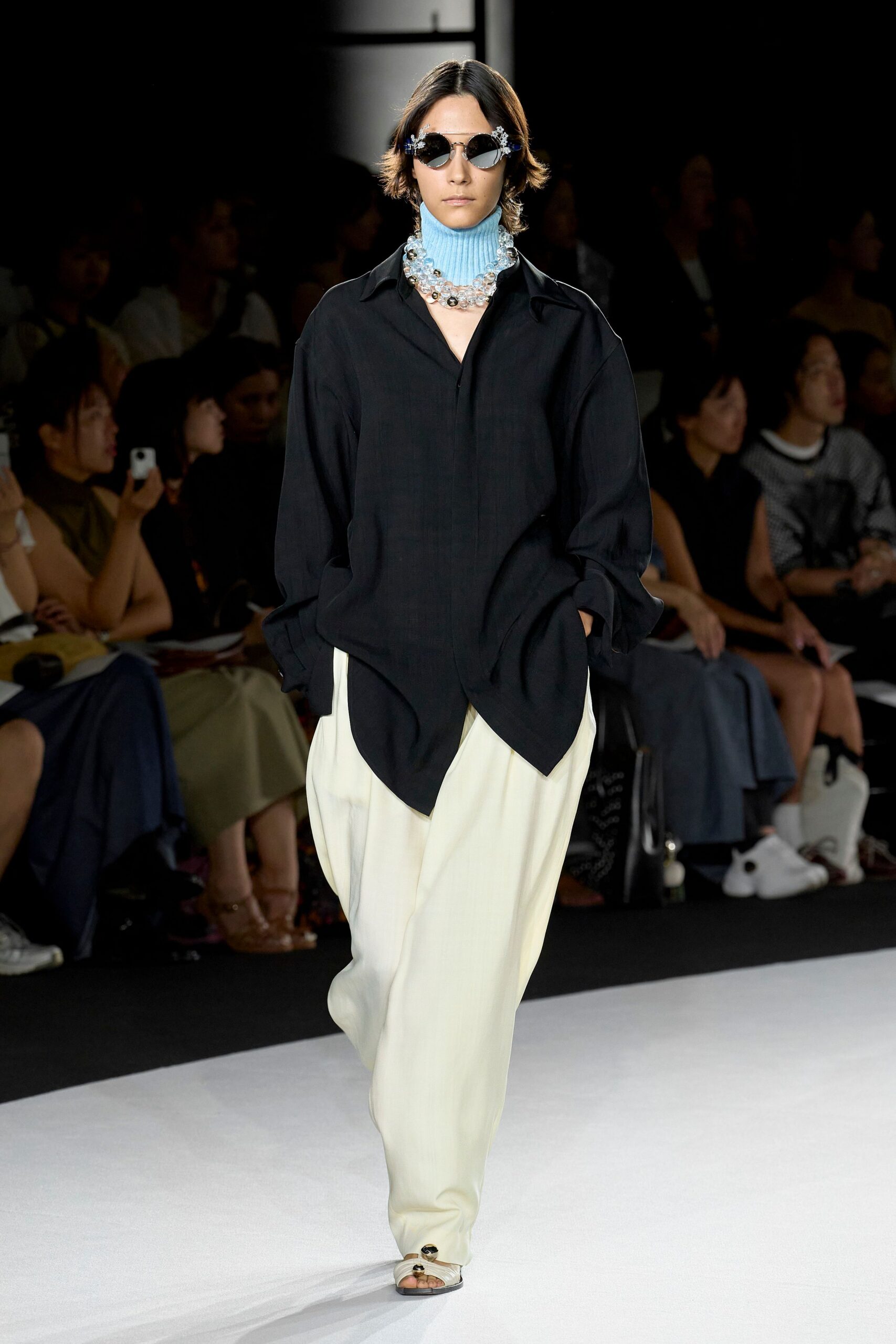 black shirt white wide-leg pants