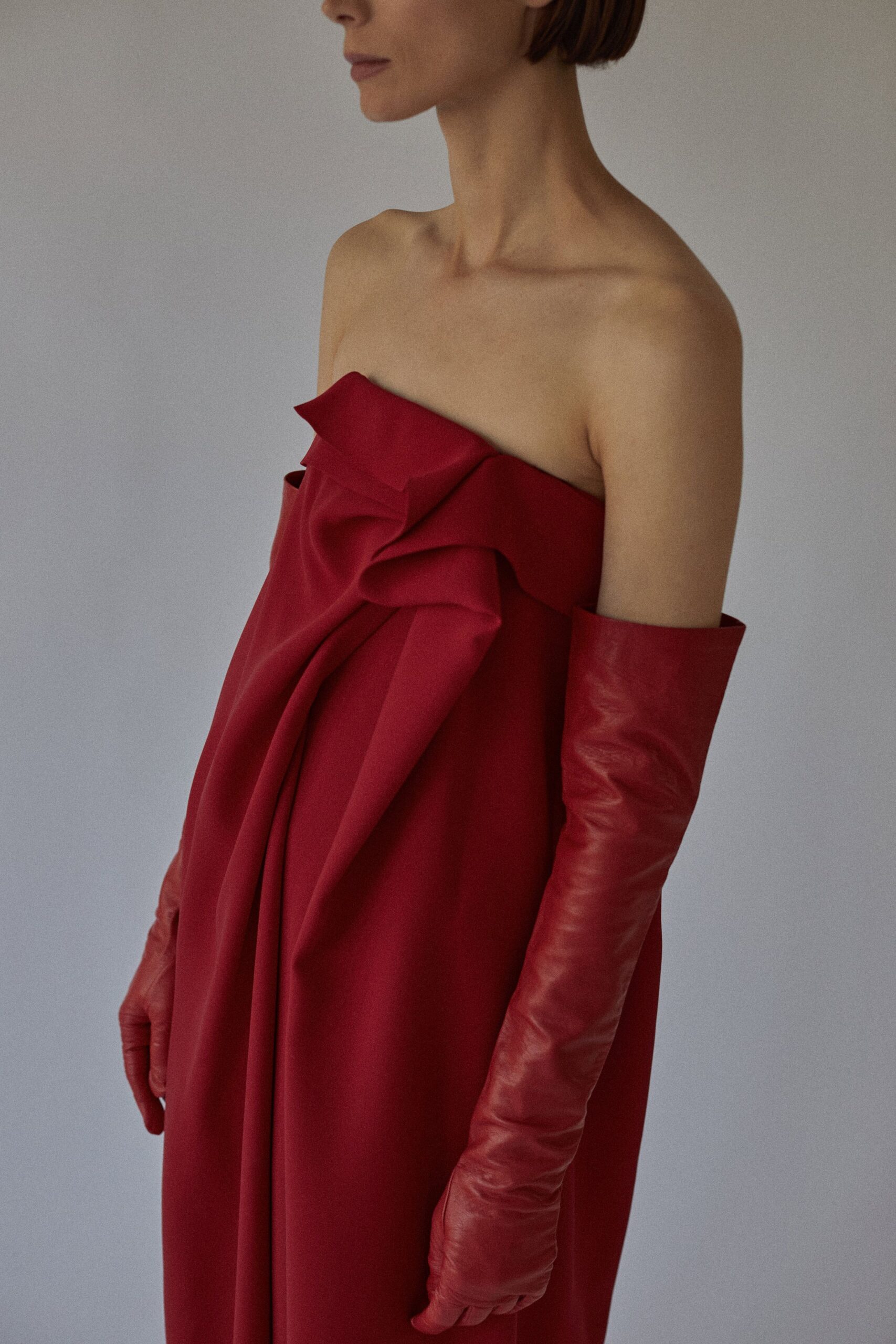 red wool strapless fitted draped dress