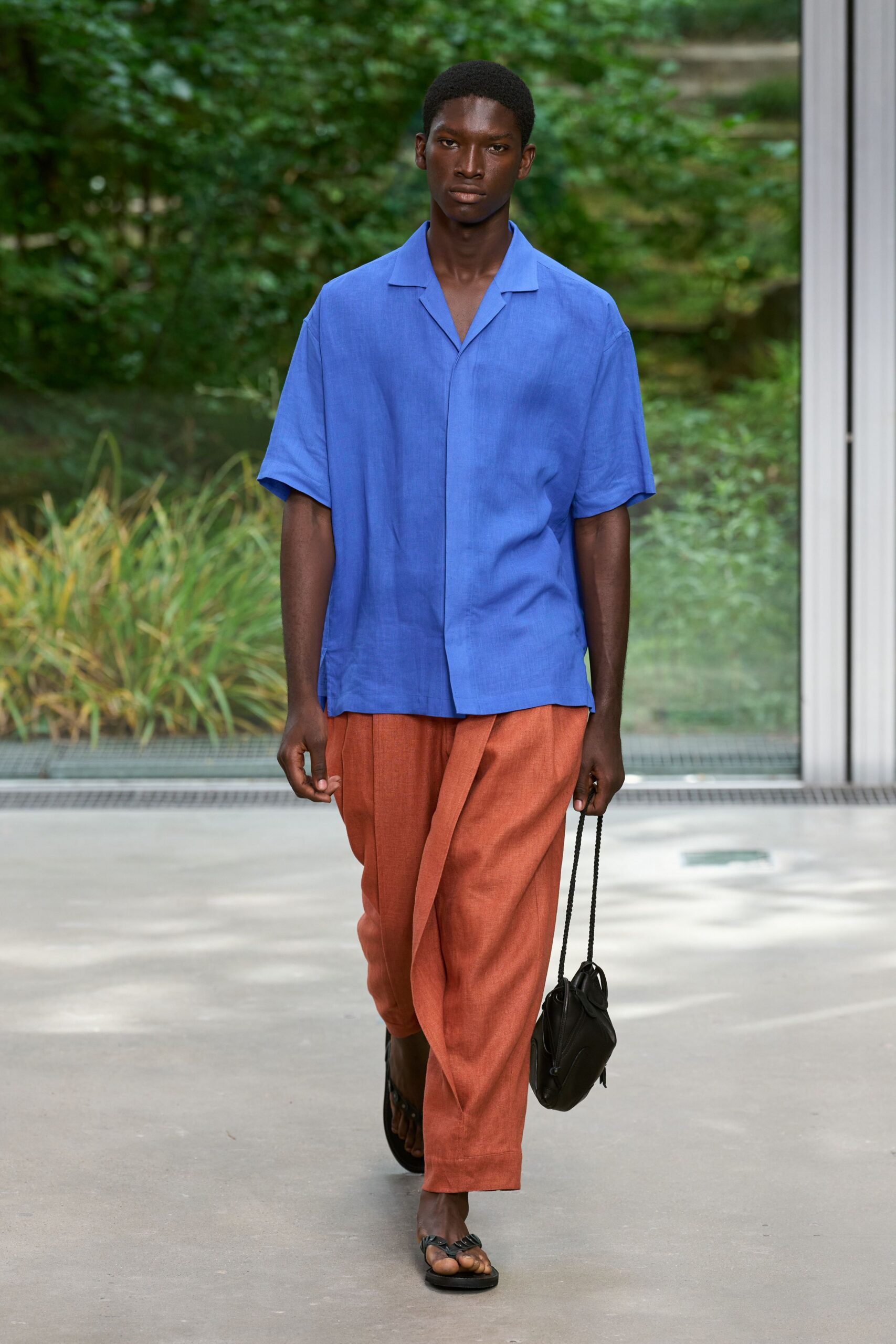blue shirt and orange pants