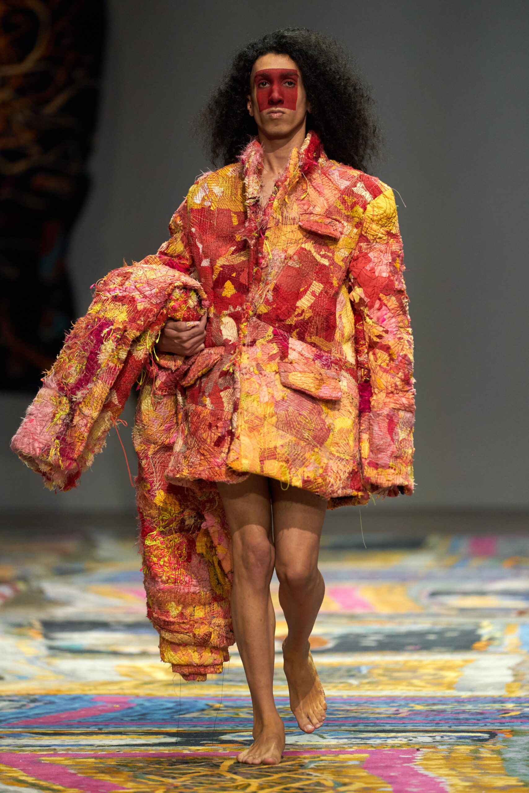 oversized pink and yellow coat