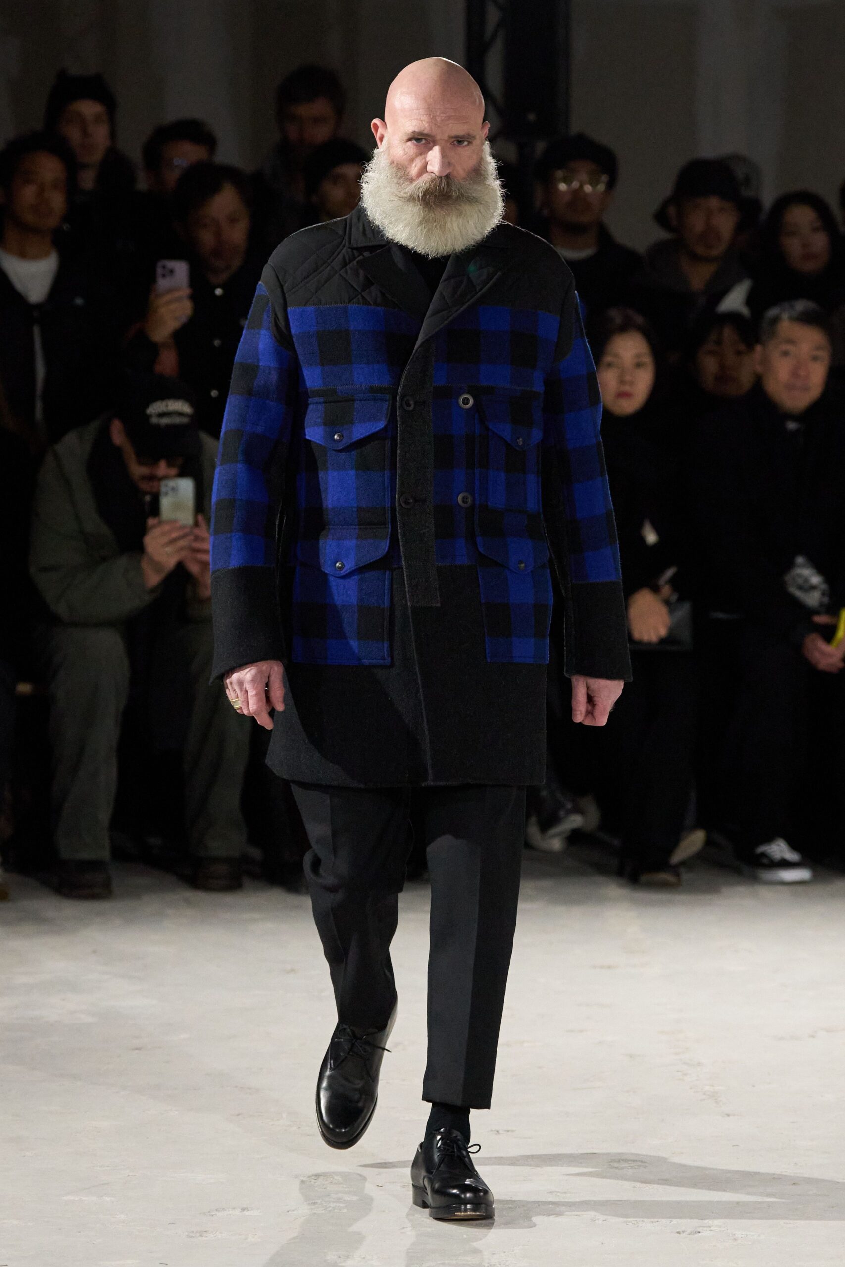 blue and black checked coat