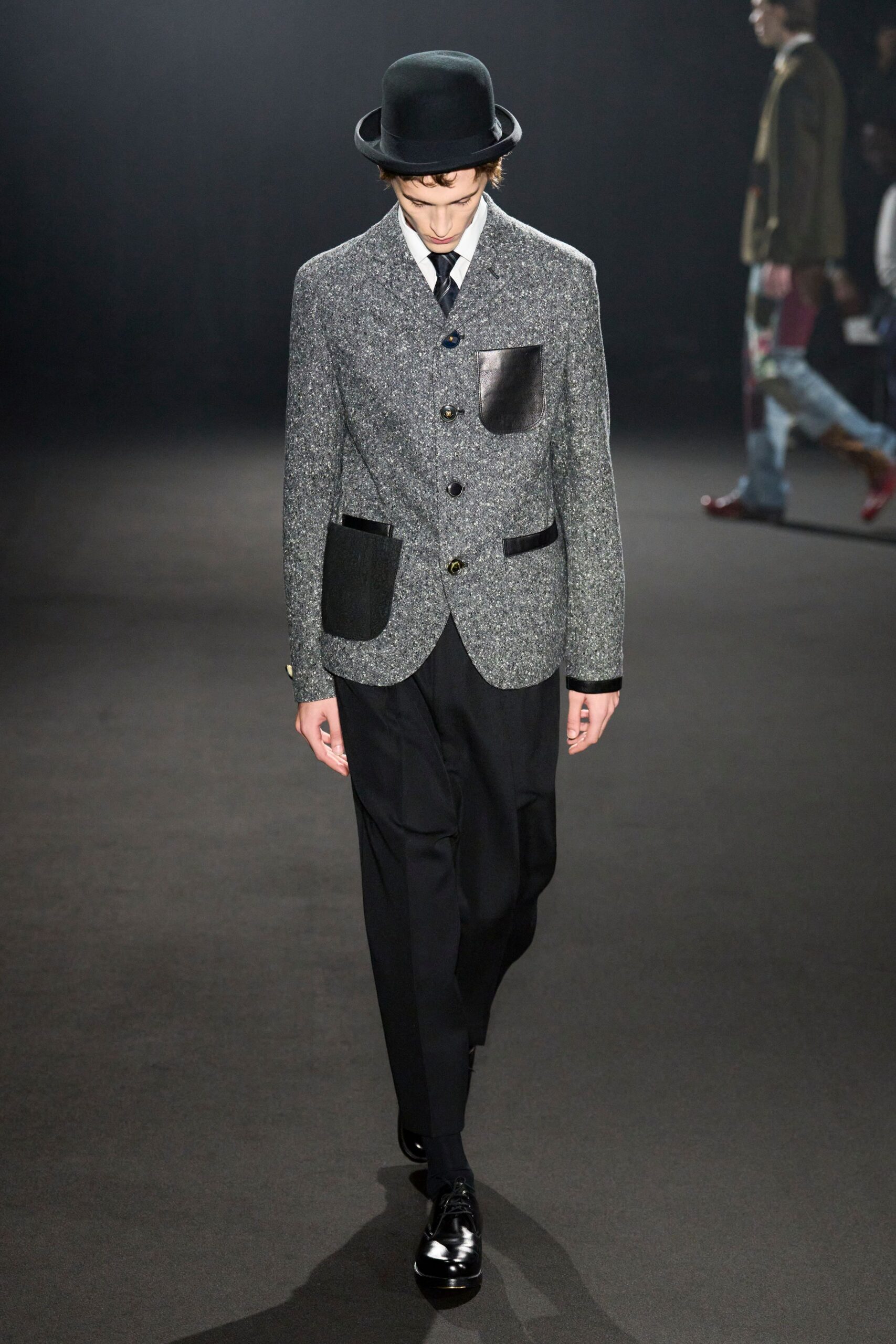 gray tailored blazer with black pants