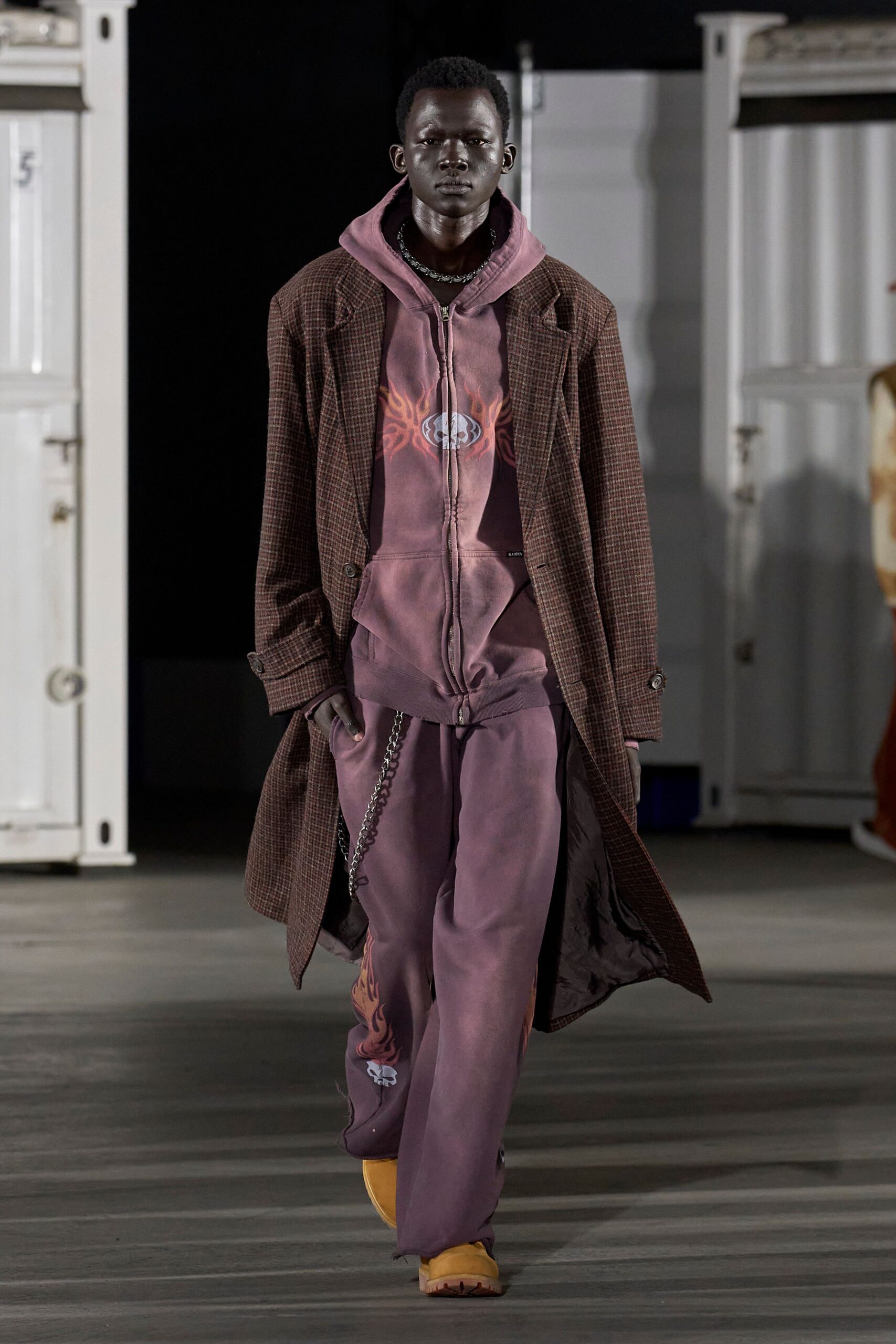 brown tweed coat with purple hoodie