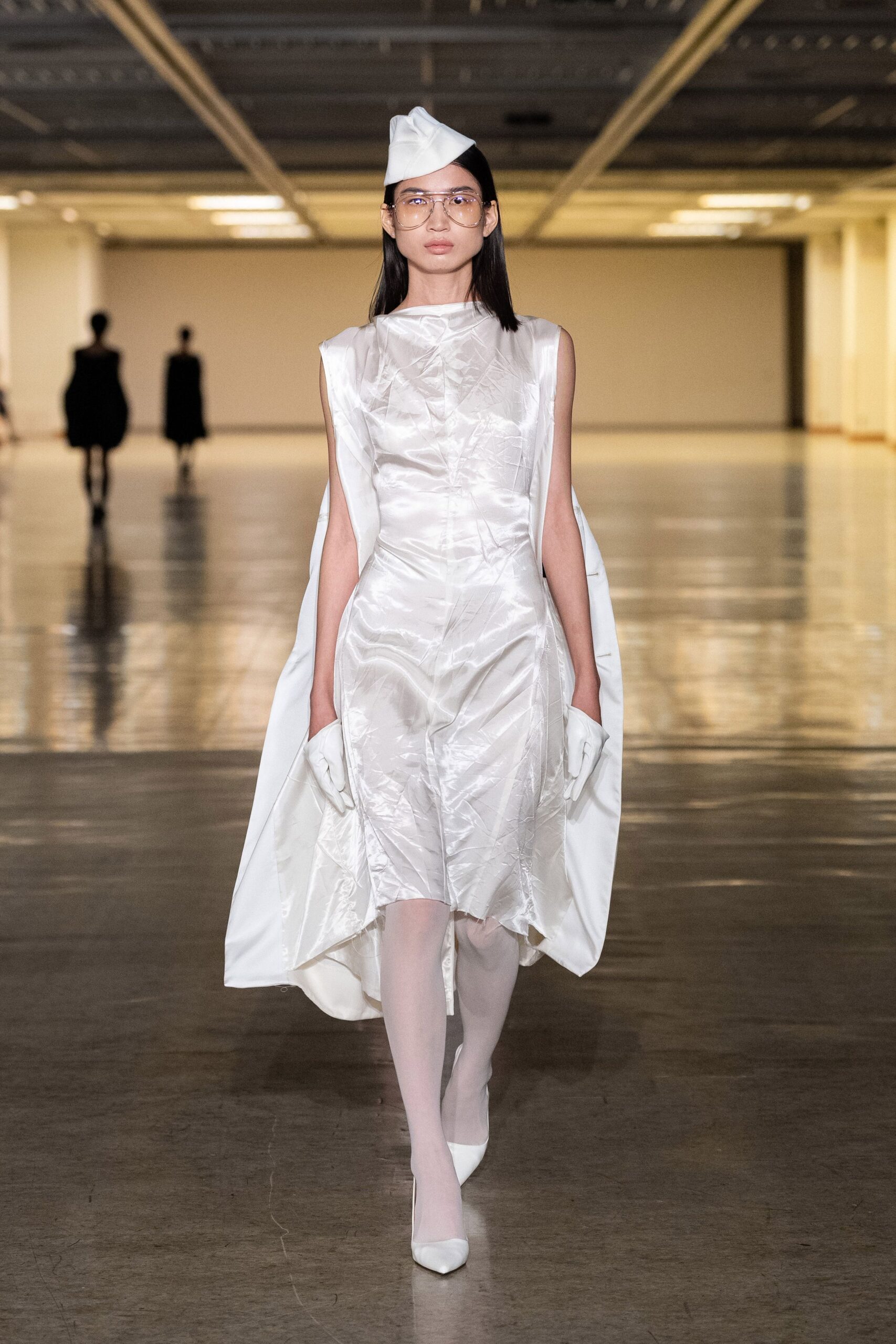 white silk sleeveless high-neck fitted draped shiny dress