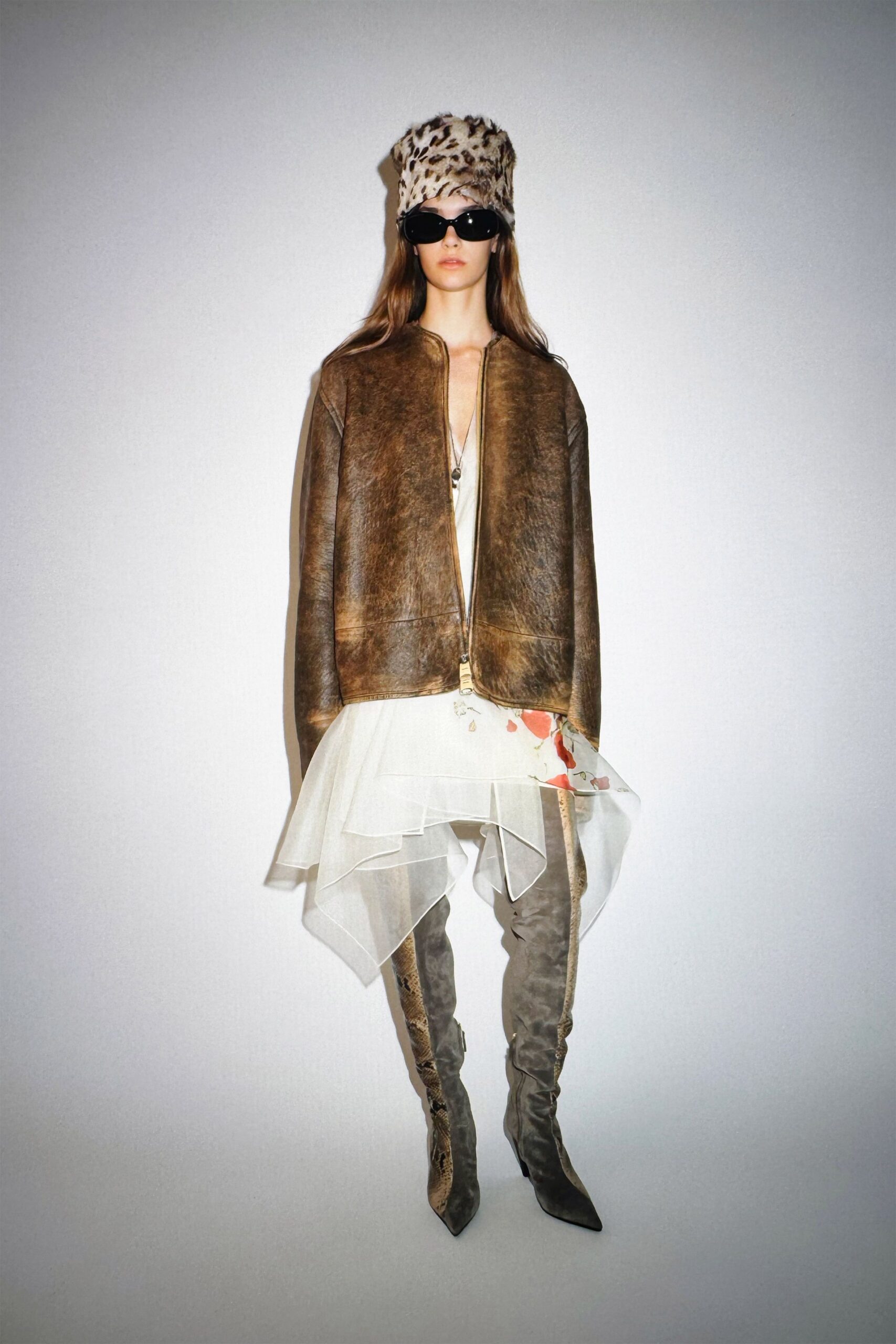 brown fur jacket white asymmetric dress