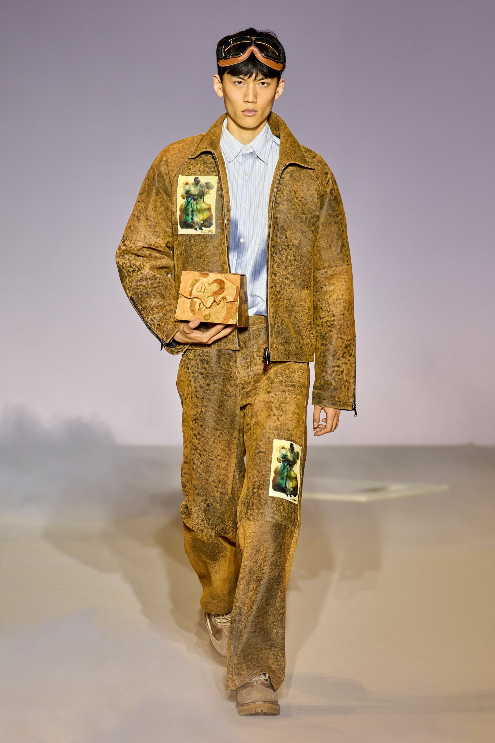 brown leather jacket with blue shirt