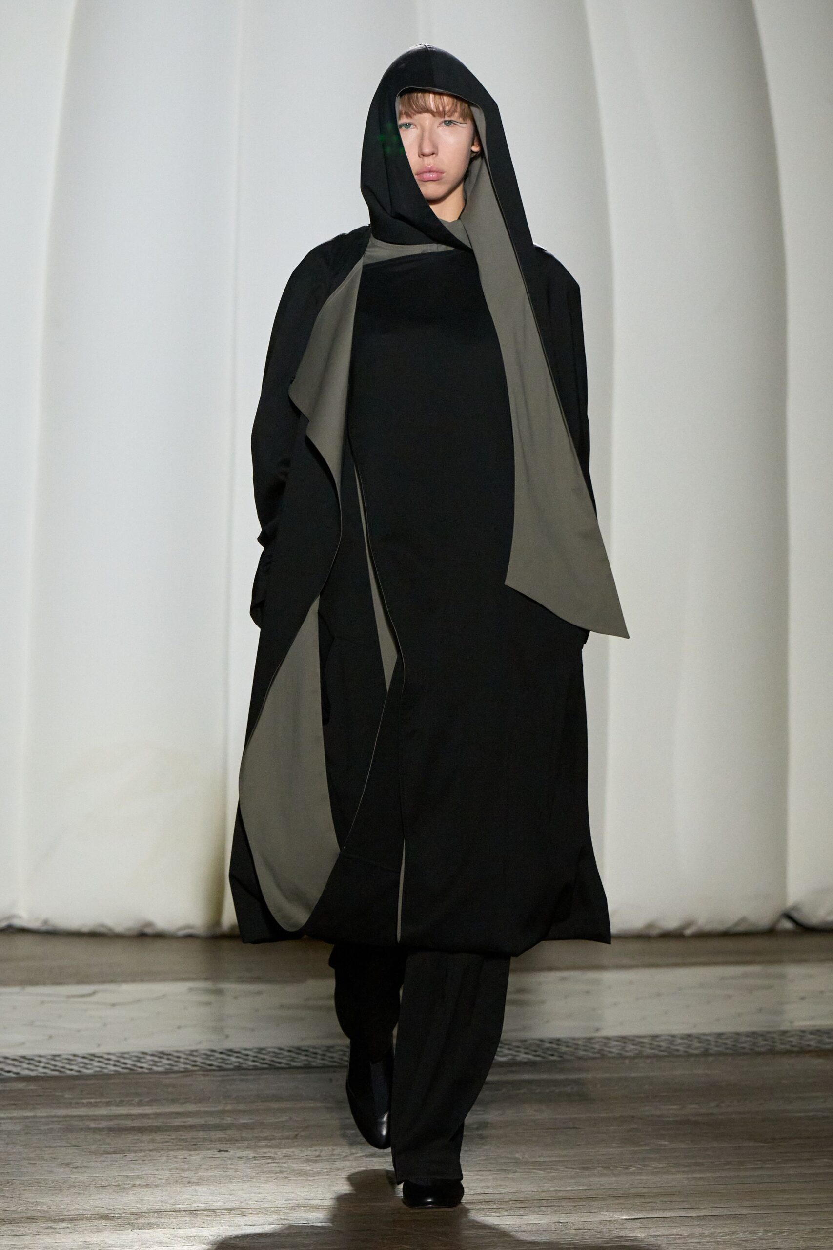 black and green draped dress with pants