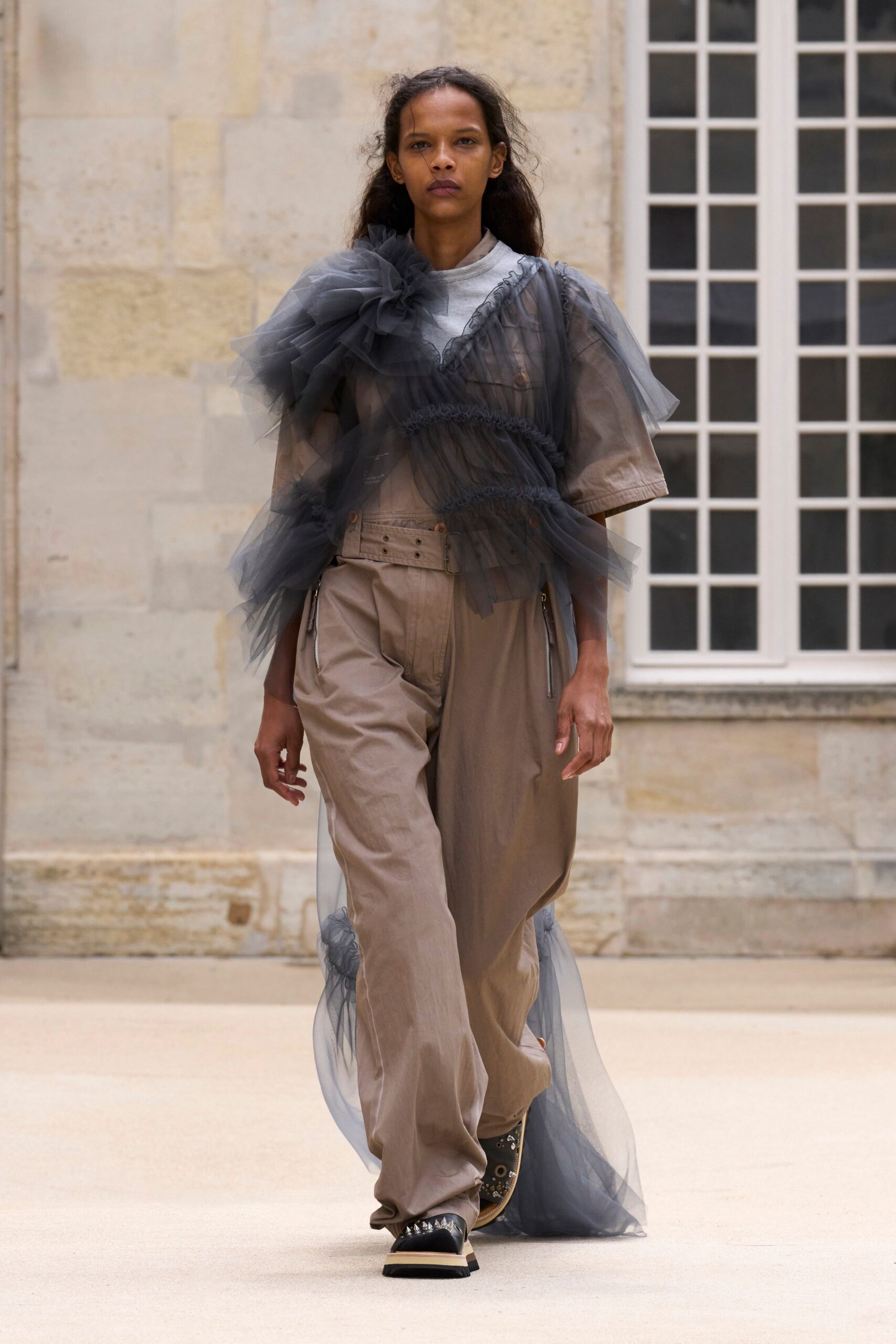 beige cotton relaxed jumpsuit with gray tulle overlay