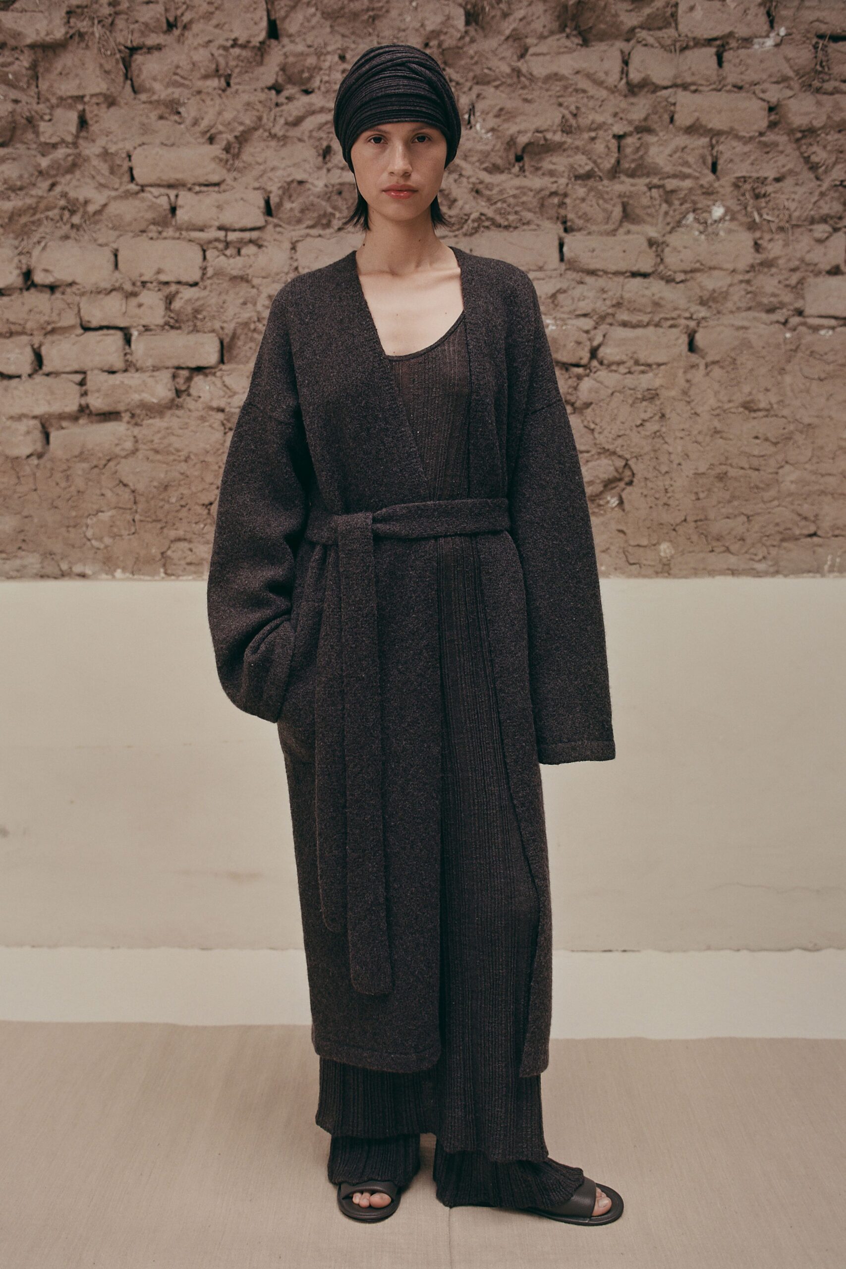 black cotton sleeveless v-neck fitted pleated jumpsuit