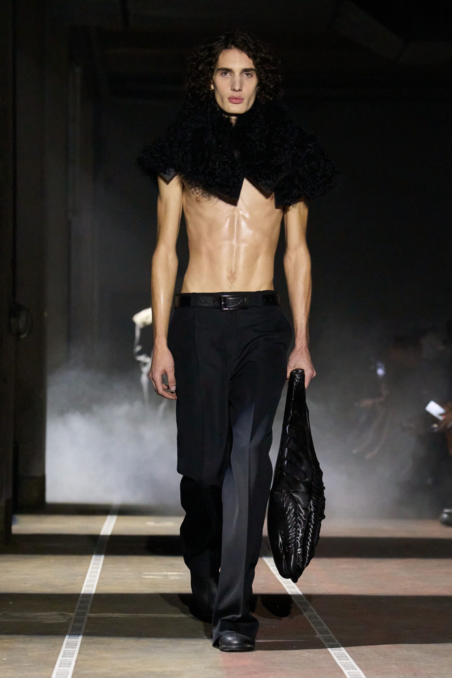 black fitted pants with fur cape
