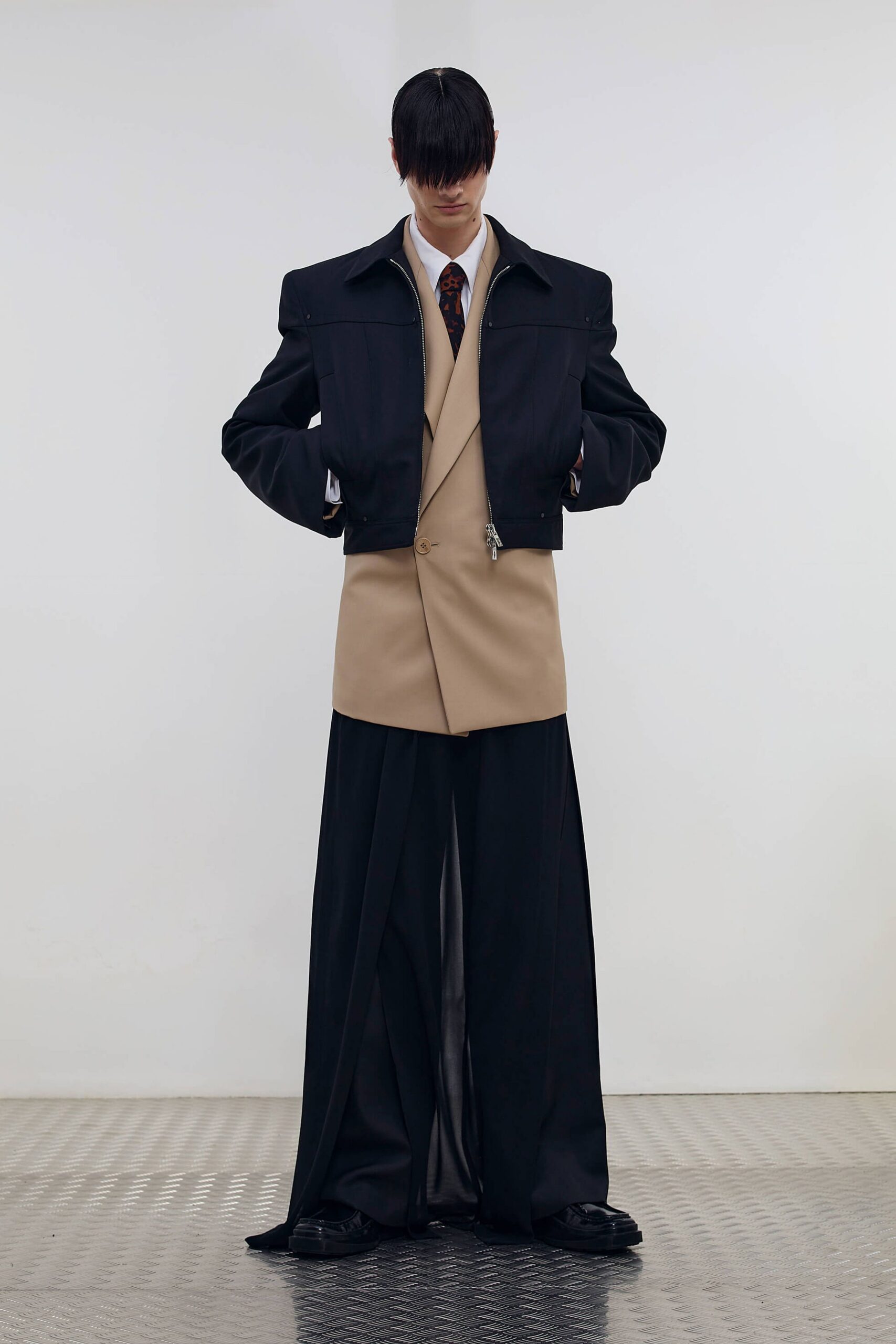 black jacket beige blazer relaxed pants
