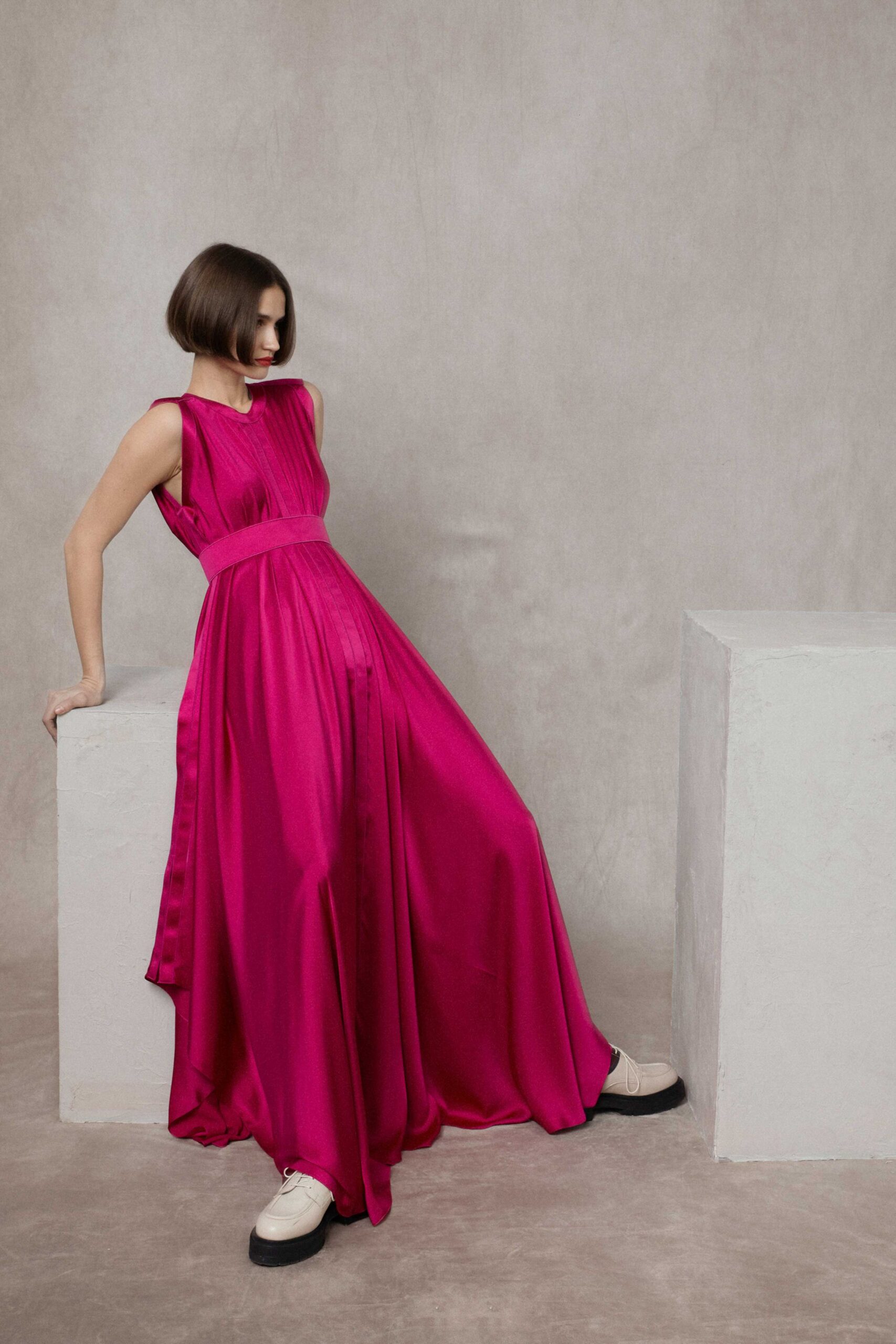 pink silk sleeveless v-neck fitted draped flowing gown