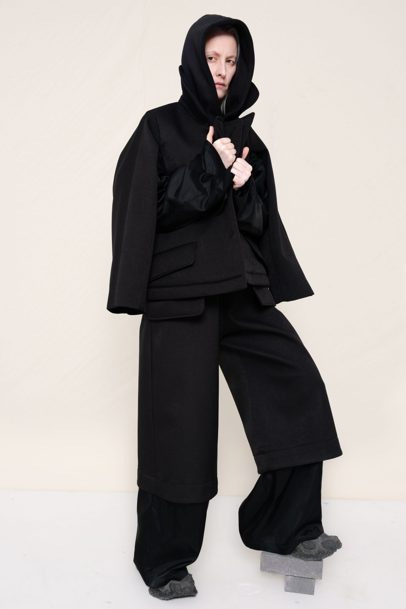 black wool long-sleeve hooded oversized layered jacket
