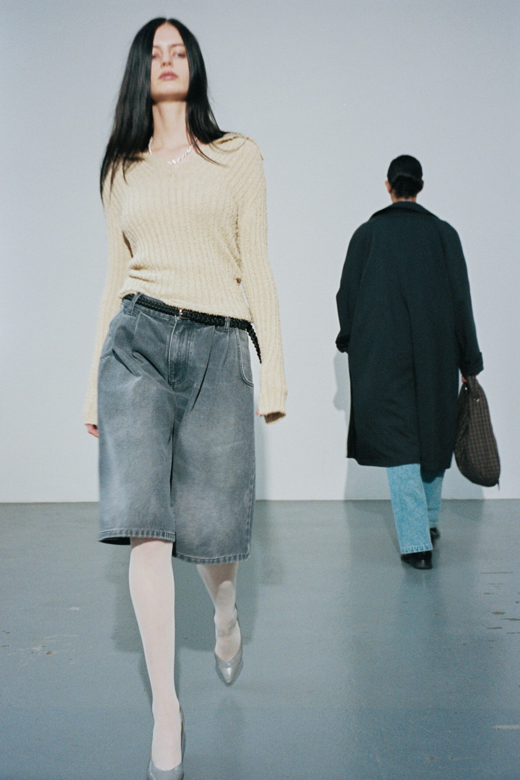beige fitted top with gray shorts