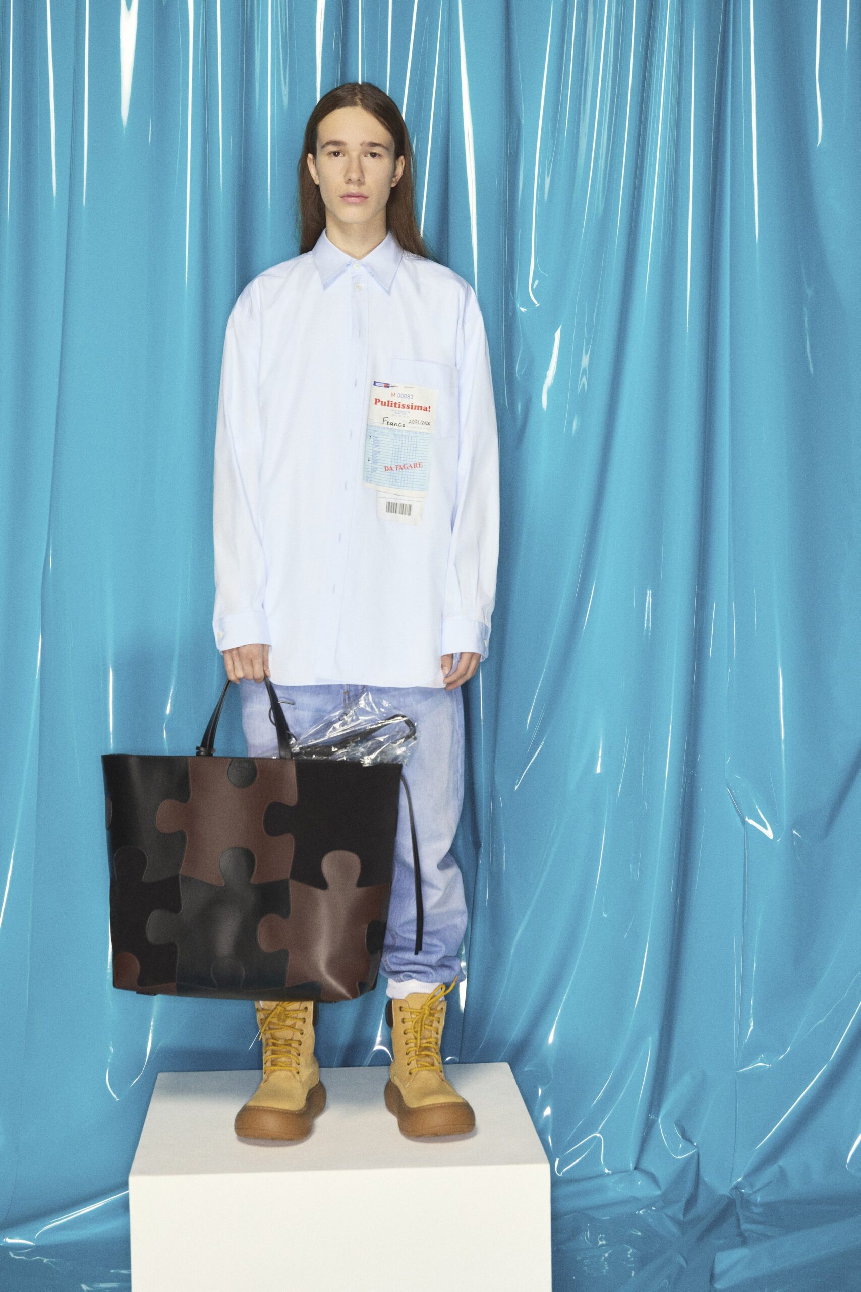 white shirt blue pants brown boots