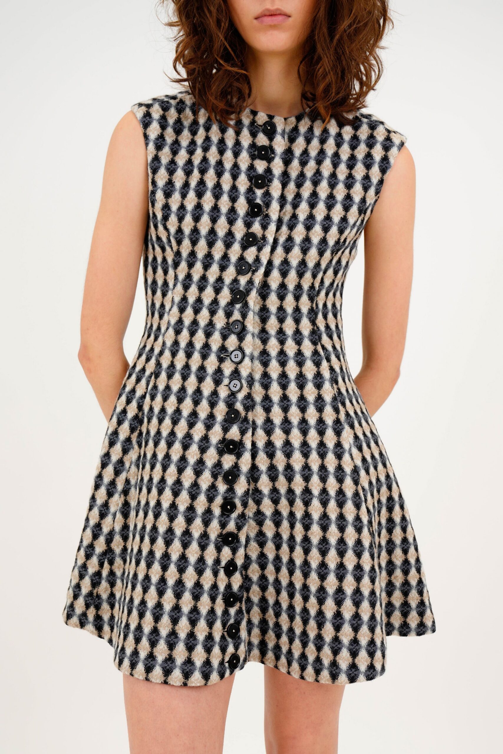 beige and black sleeveless dress