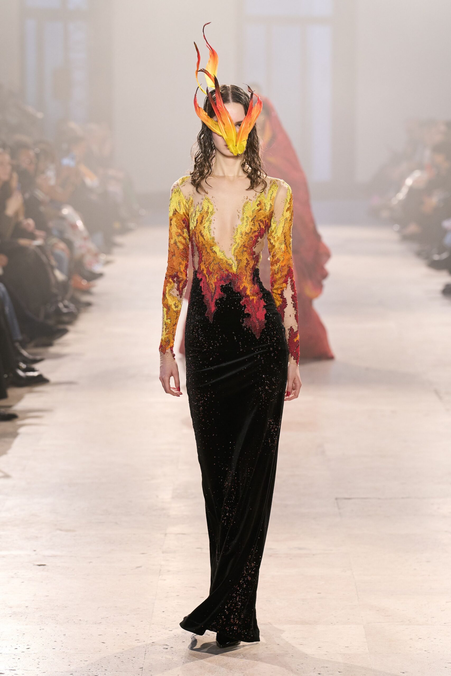 fitted black velvet gown with flame hat