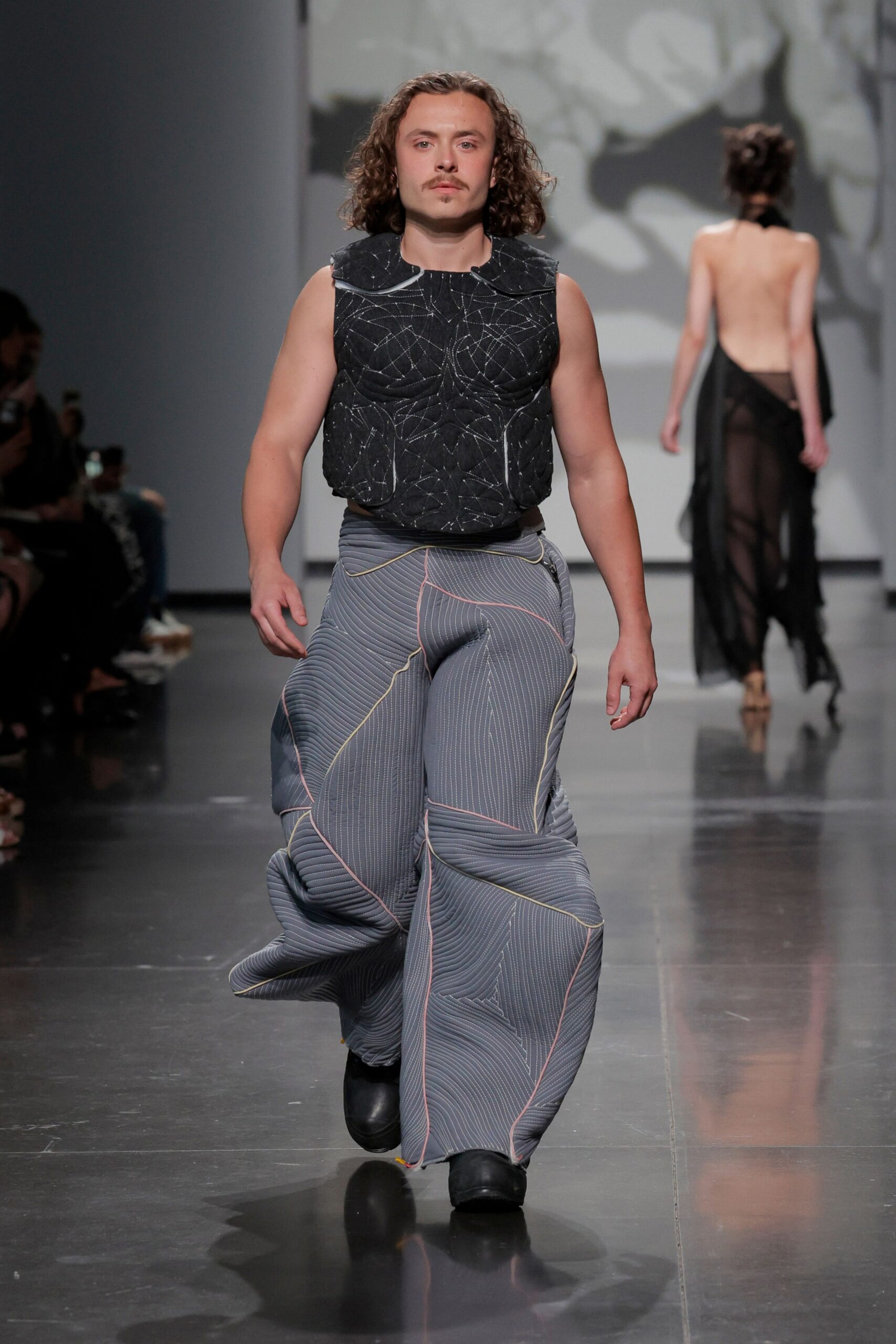 black fitted top with gray pants