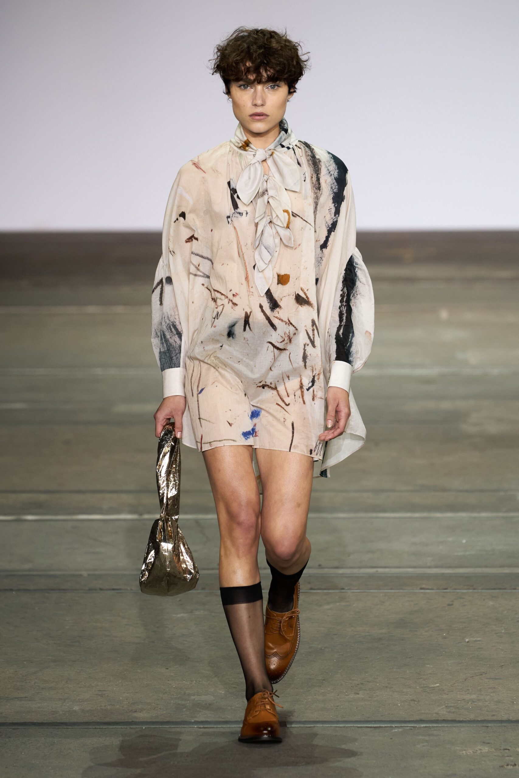 beige printed mini dress with shoes