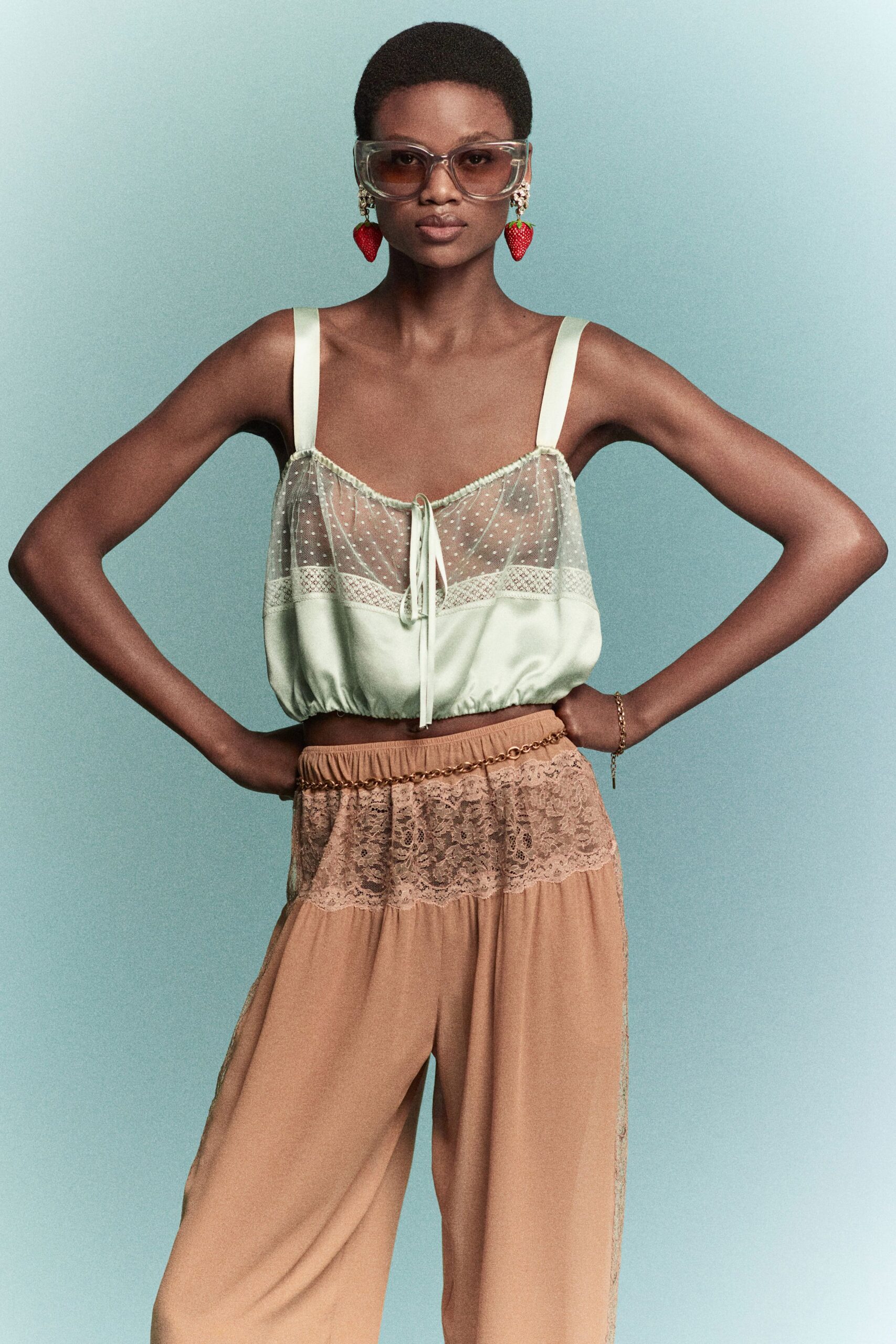 green silk sleeveless v-neck fitted ruffled sheer top