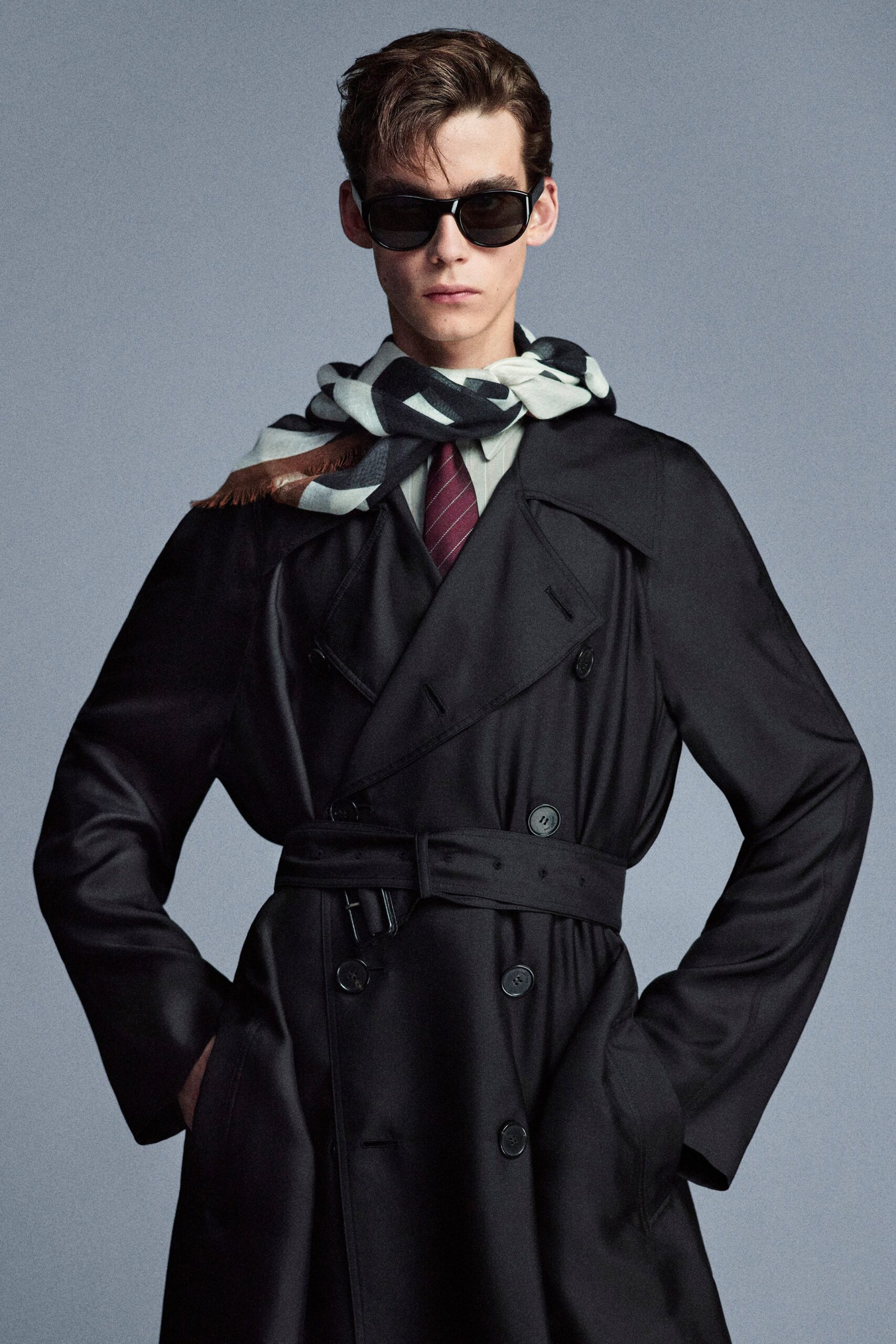 black wool long-sleeve collared structured belted trench
