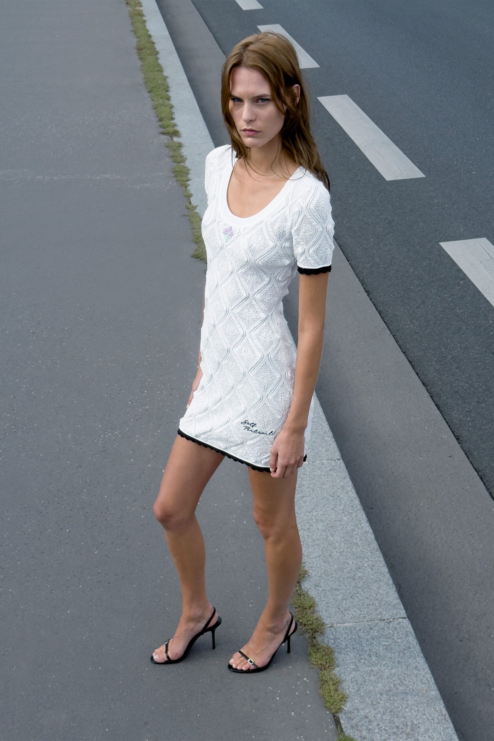 white ribbed mini dress with black accents