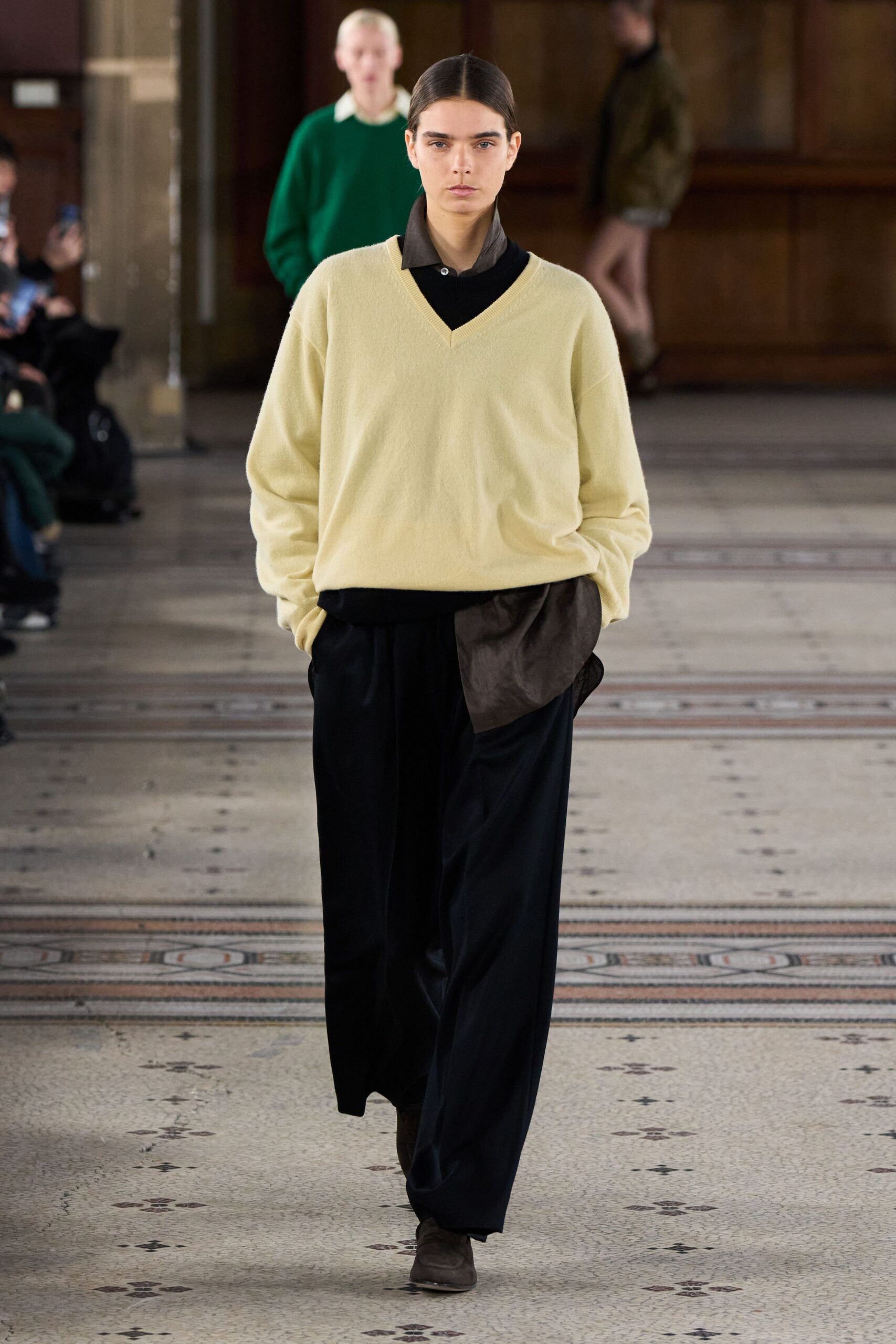 yellow relaxed sweater with black pants