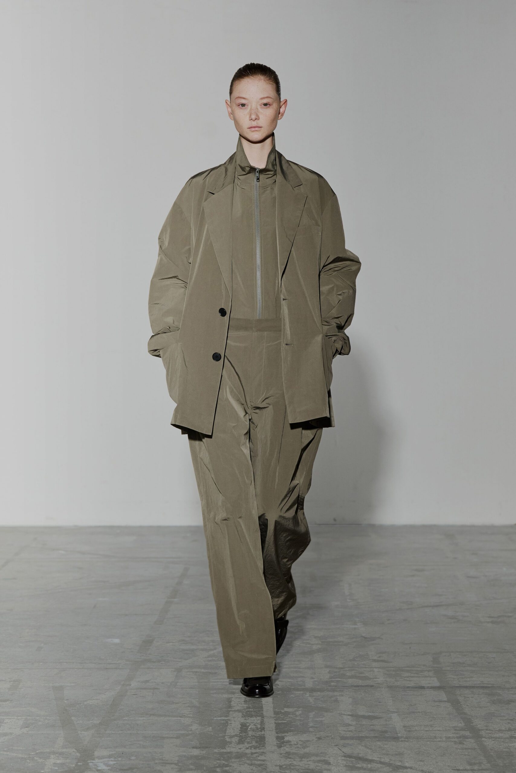 oversized green jacket and relaxed pants