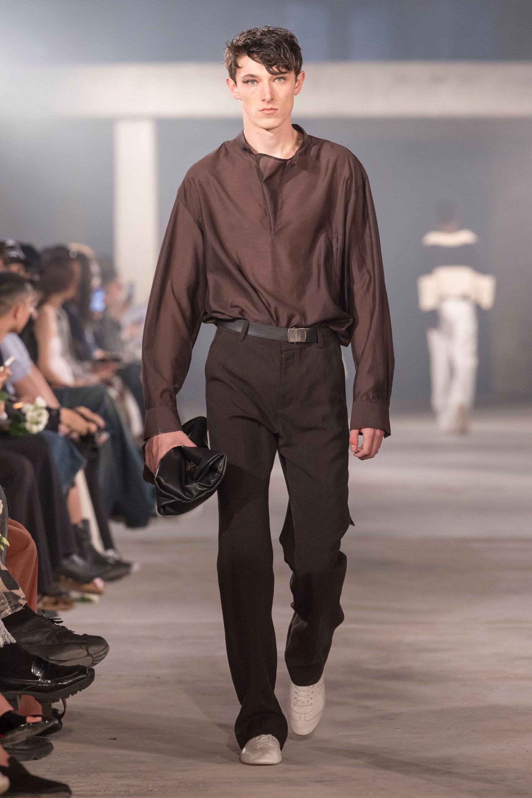 brown relaxed shirt with black tailored pants