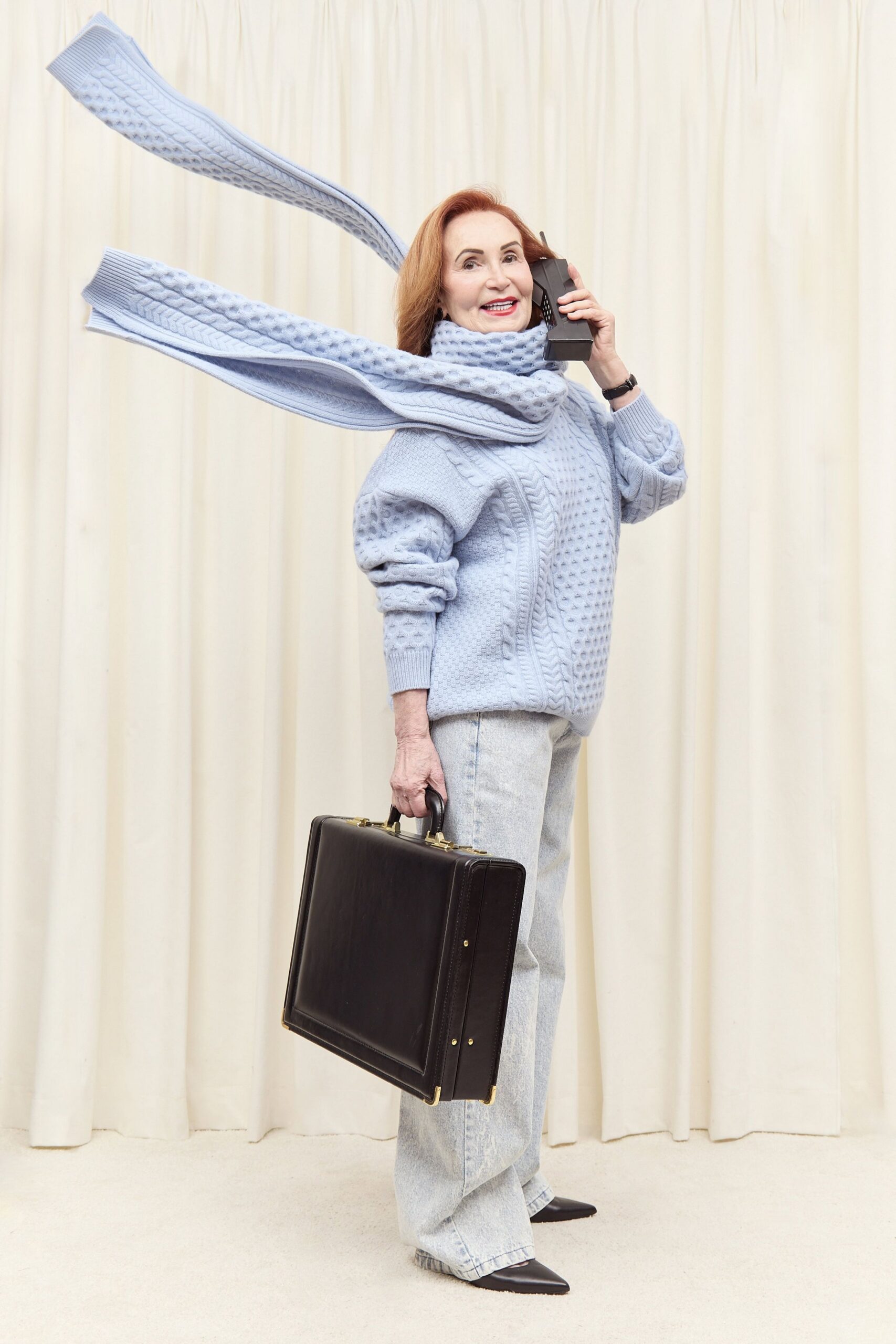 blue relaxed sweater with denim pants