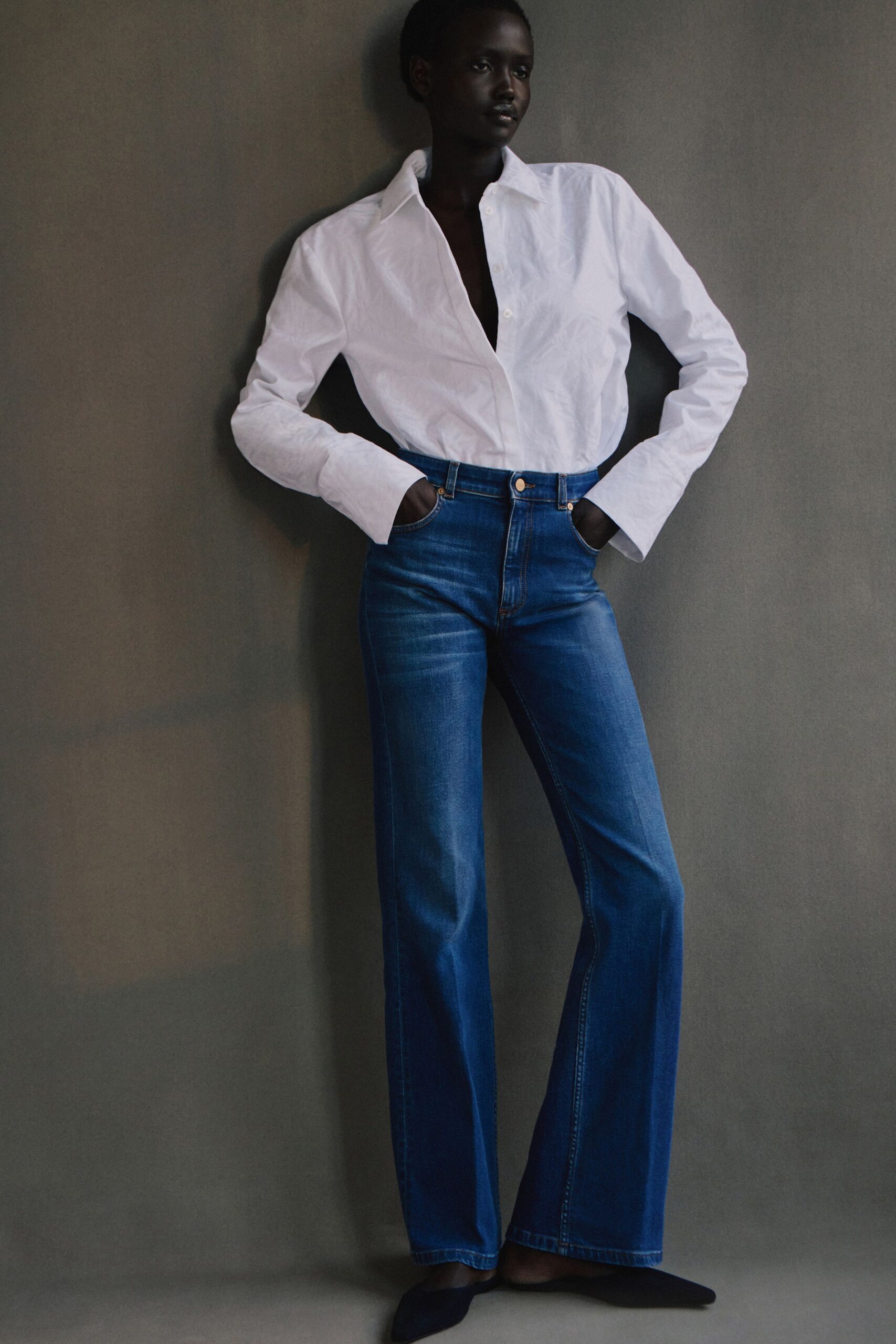 blue denim fitted high-waisted straight-leg jeans