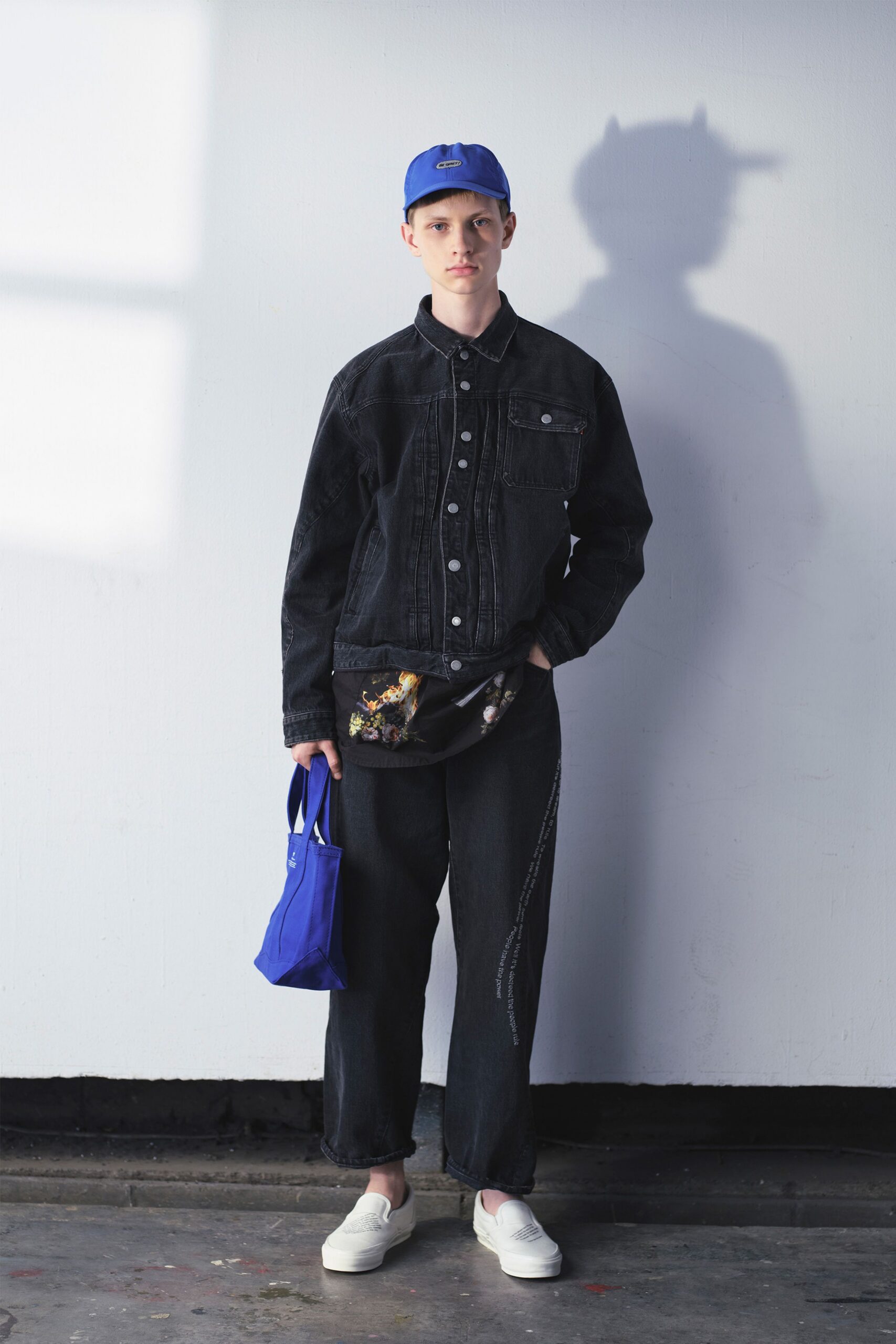 black denim jacket with relaxed pants