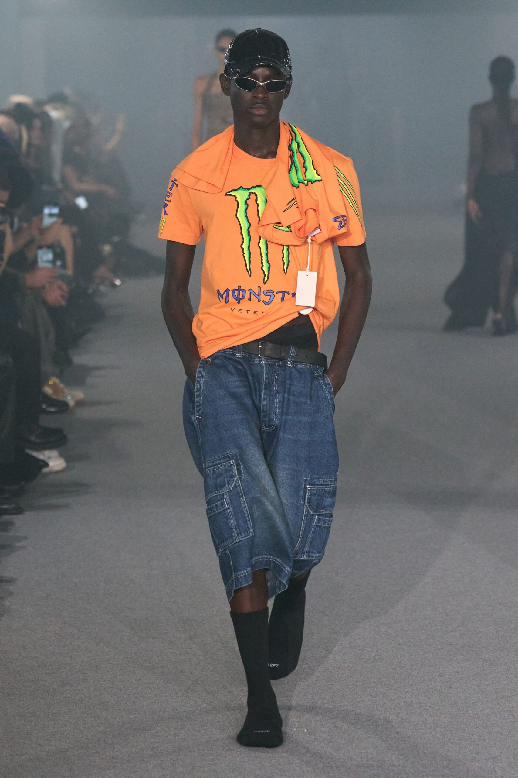 orange printed t-shirt with cargo pants