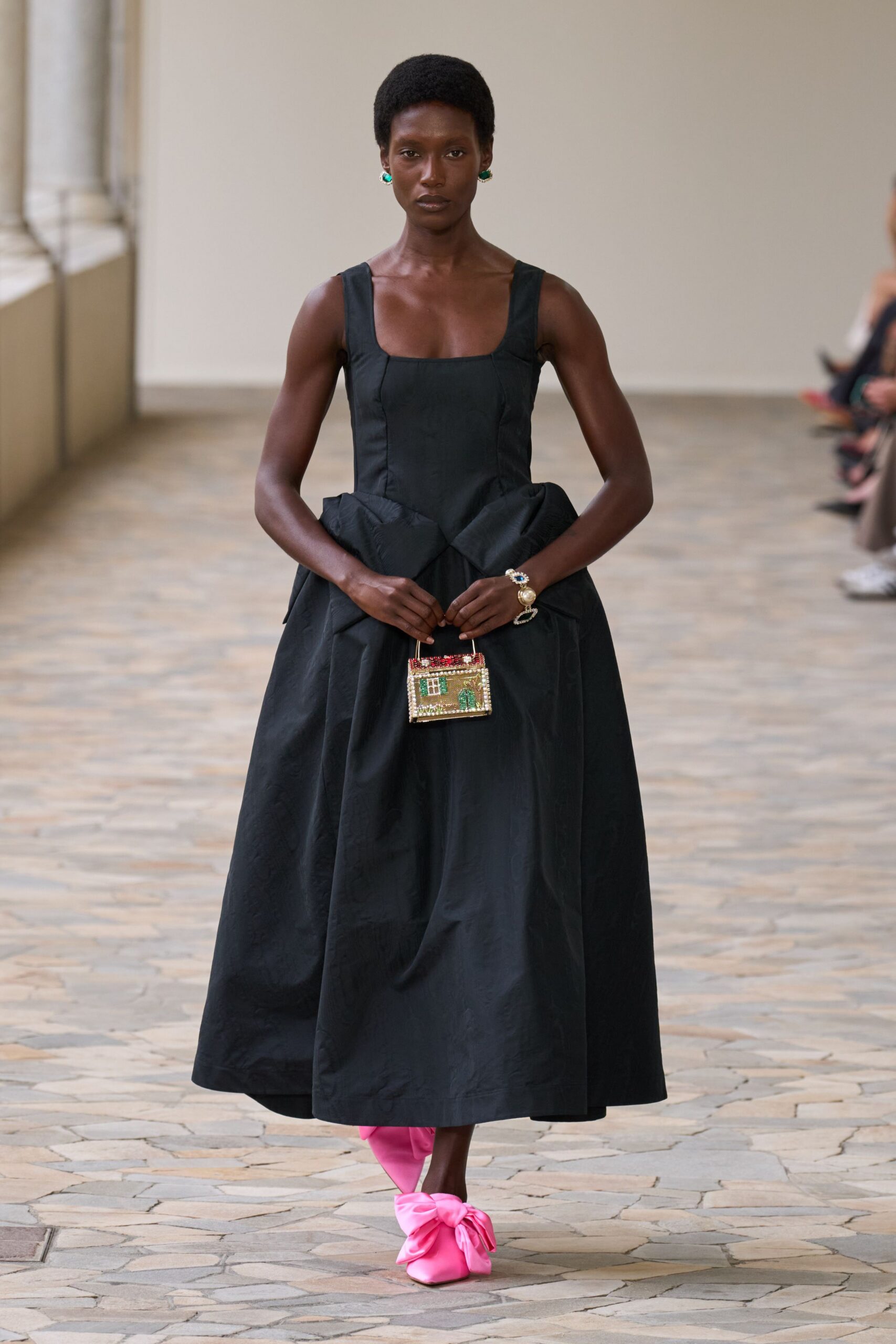 black maxi dress with pink shoes
