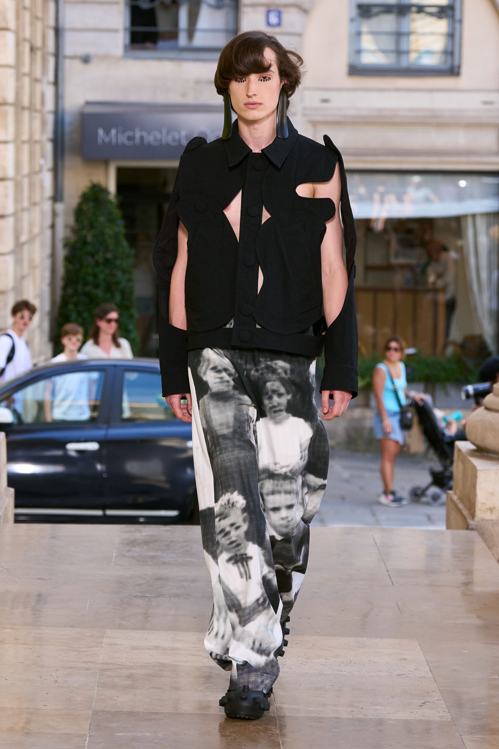 black cutout jacket with printed pants