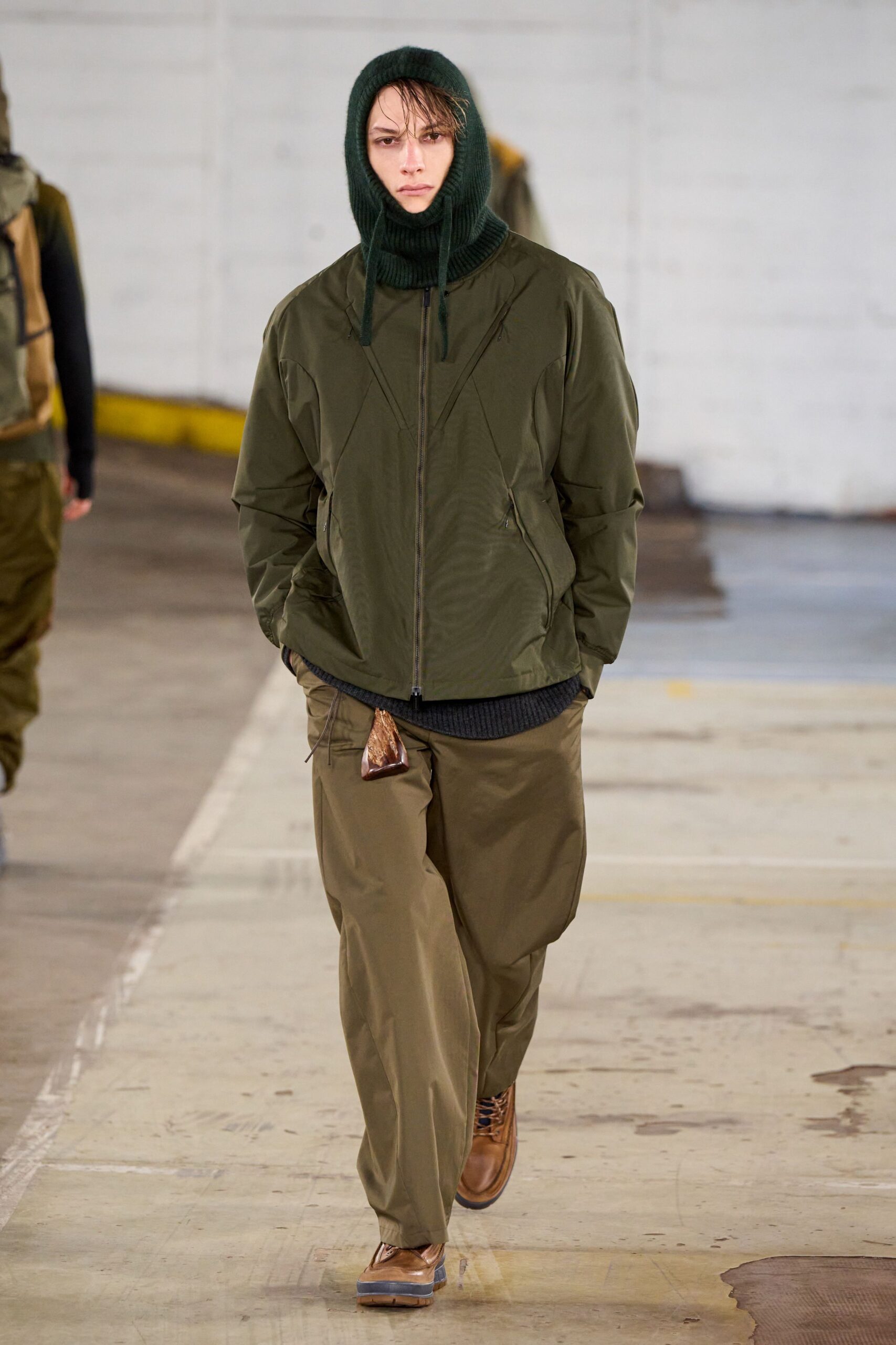 green hooded jacket with cargo pants