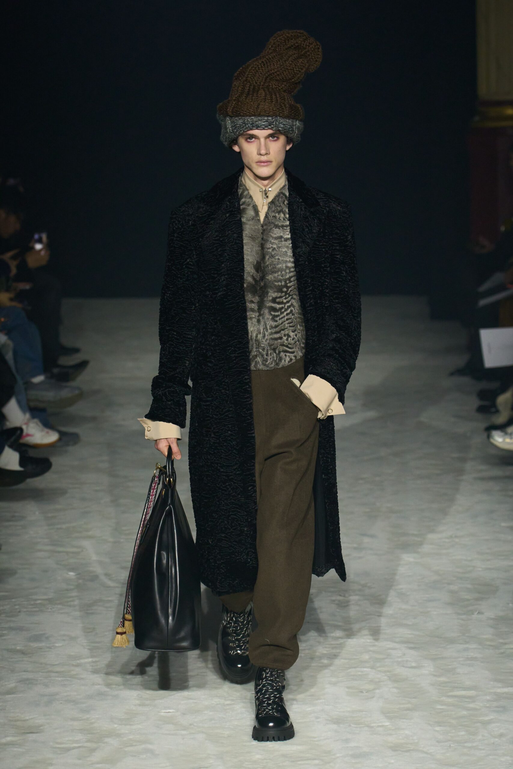 black fur coat beige shirt brown pants