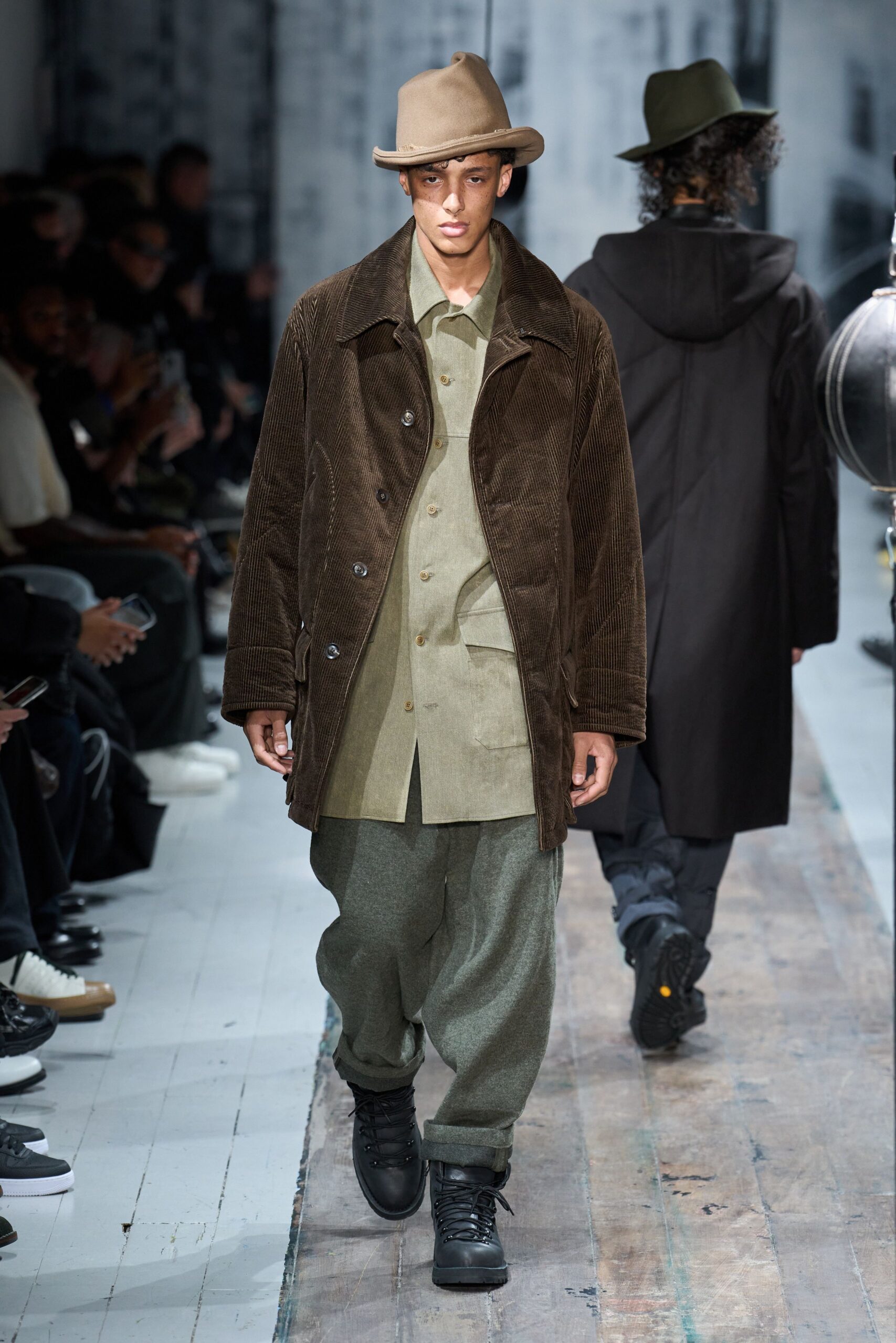 brown corduroy coat with green shirt