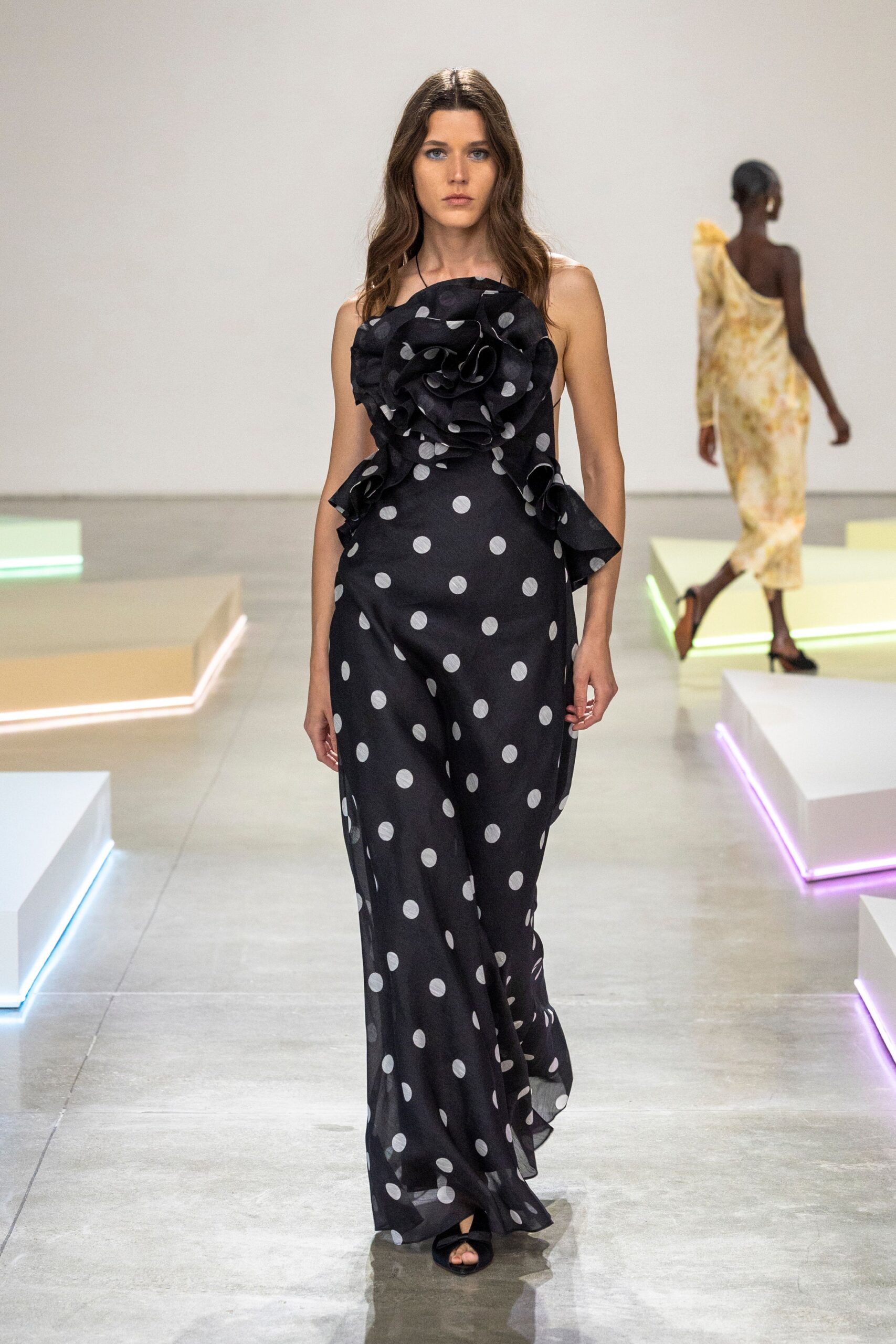 black silk sleeveless v-neck fitted ruffled polka-dot gown