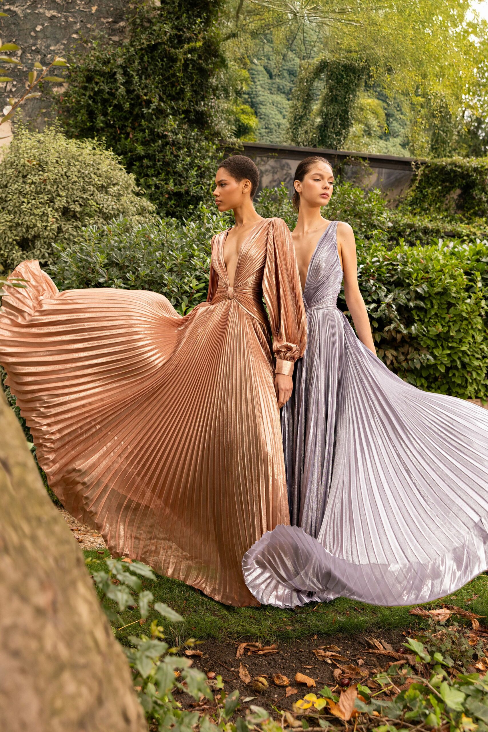 rose gold and lavender pleated gowns
