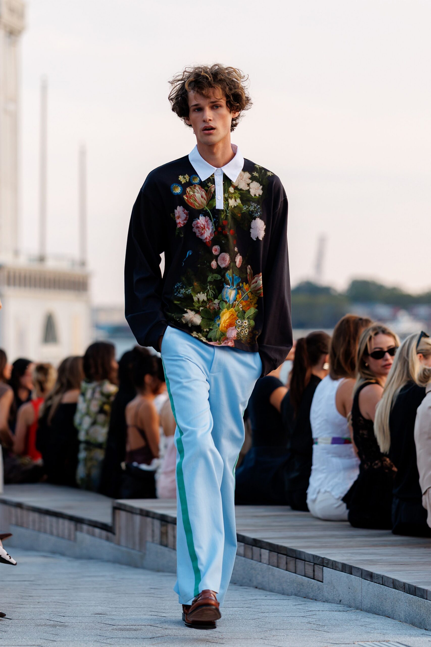 black floral shirt with blue pants