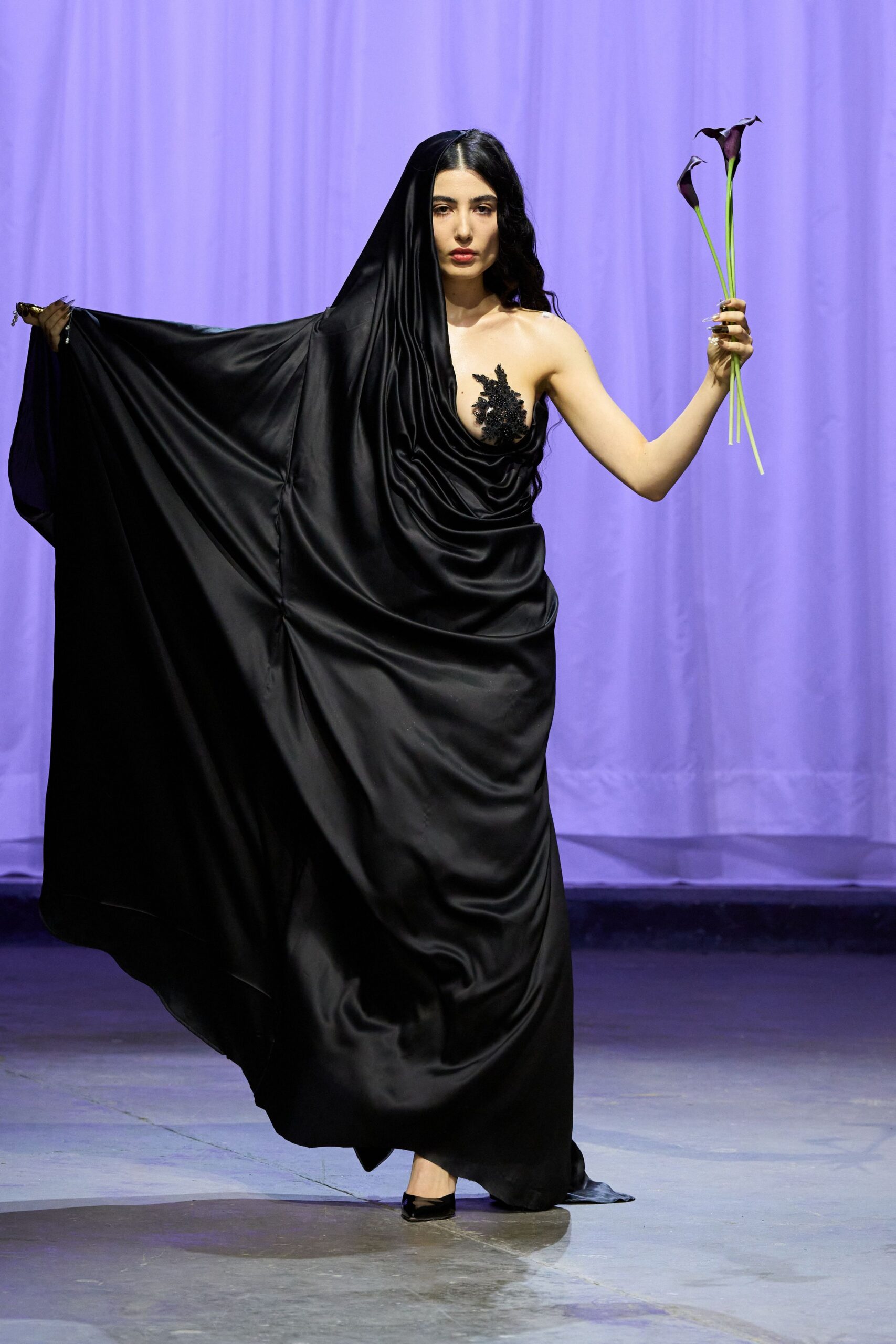 black silk draped gown