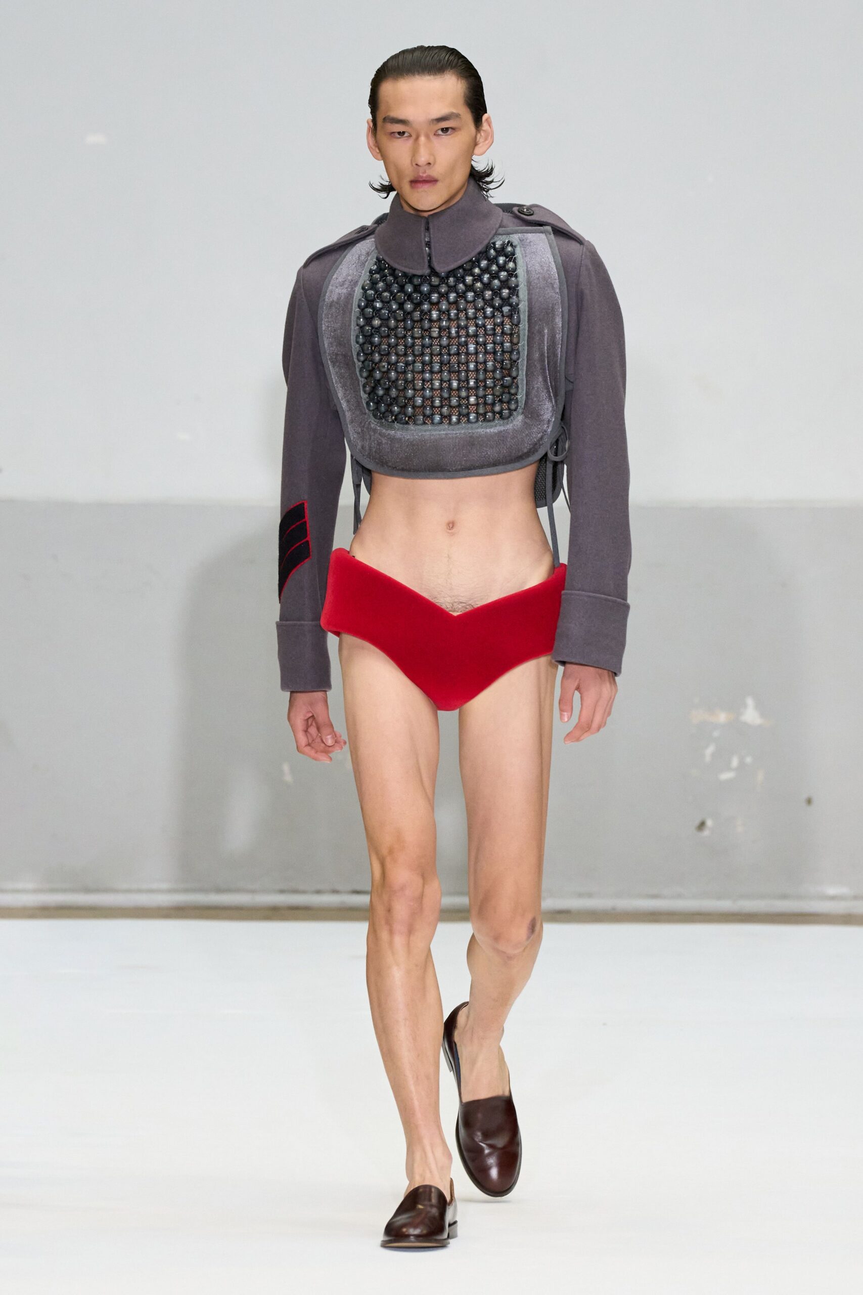 gray fitted jacket red shorts