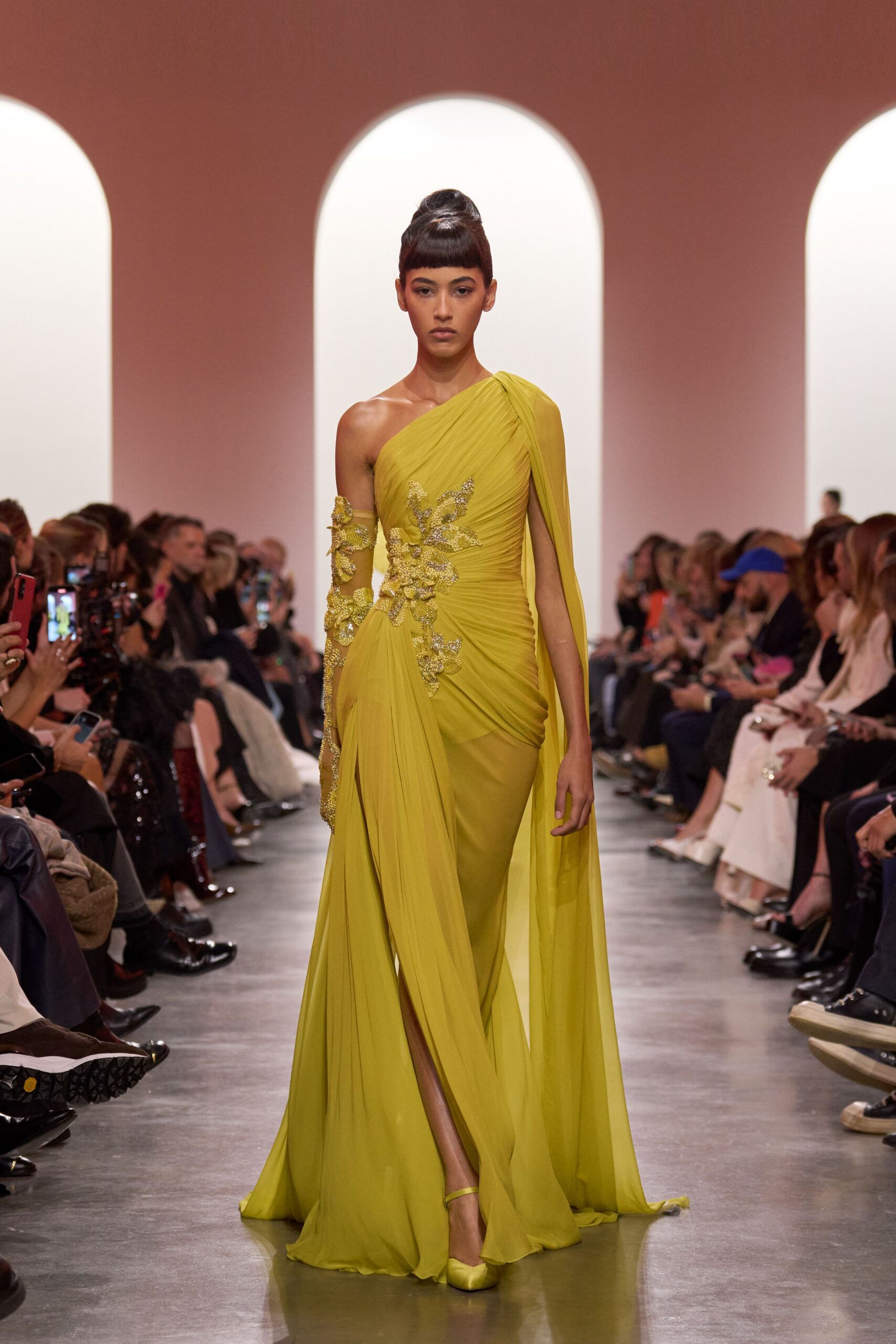 yellow silk sleeveless high-neck fitted draped embellished gown