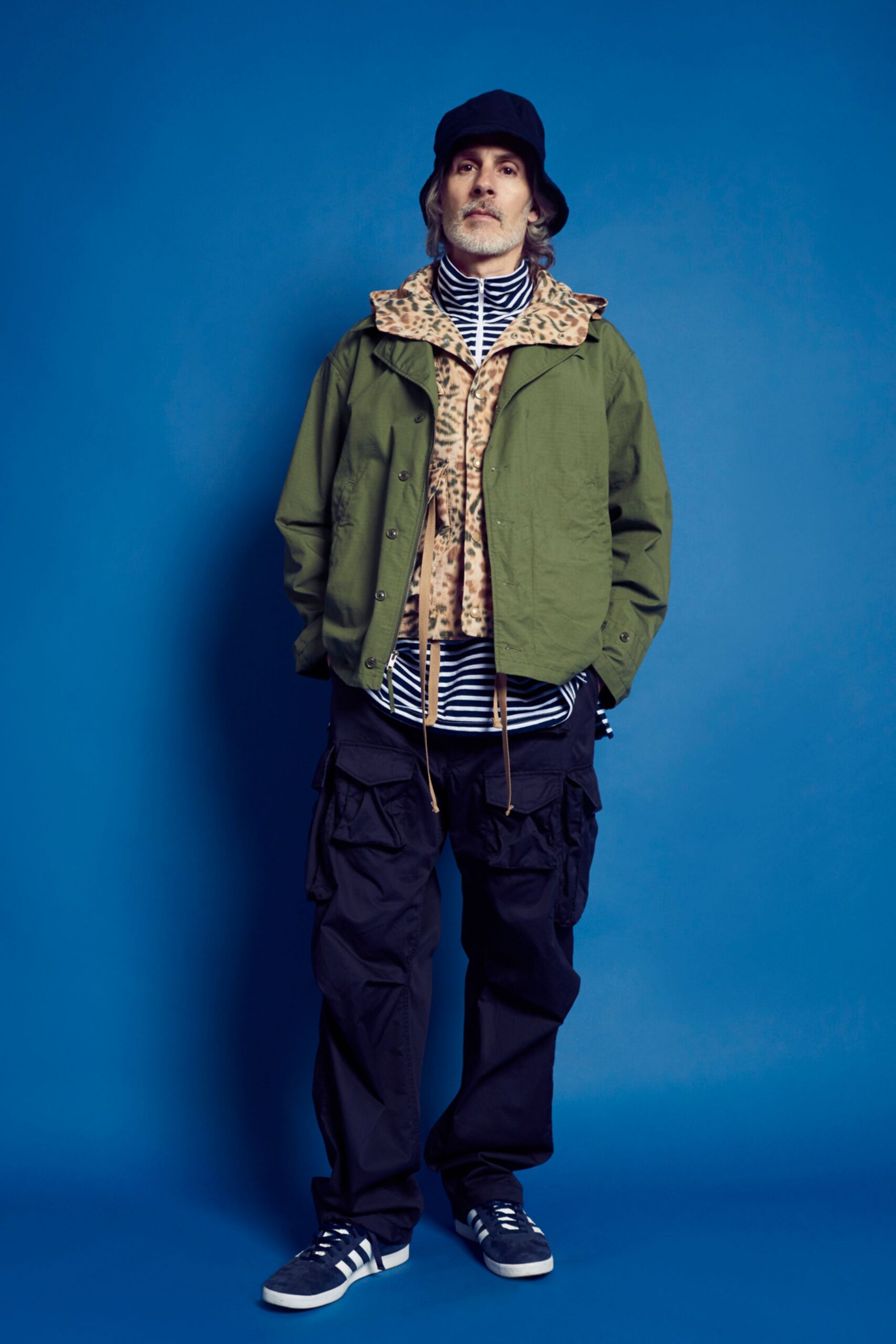 green jacket with animal-print vest